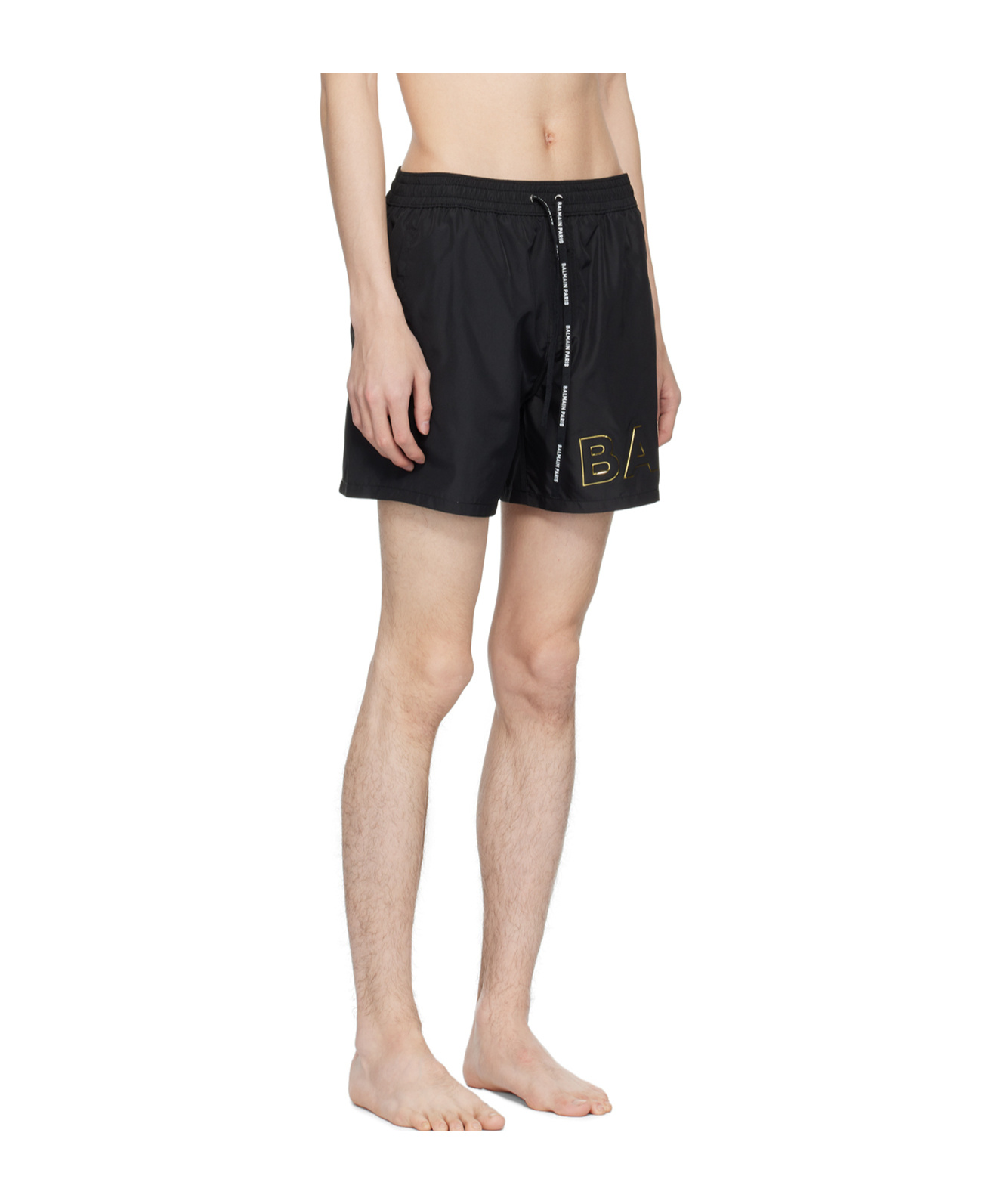 Shop Balmain Embossed-logo Swim Shorts In Black
