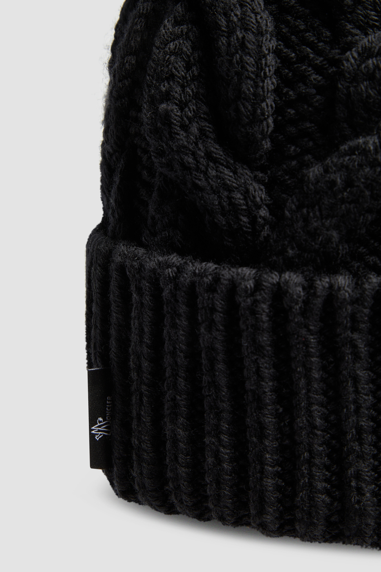 Moncler Logo Patch Wool Beanie In Black