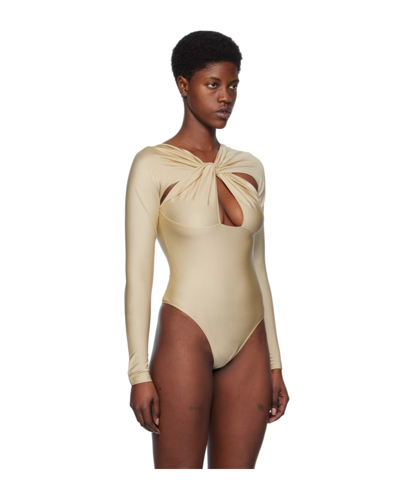 Coperni Hollowed Out Long-sleeved Jumpsuit In Nude