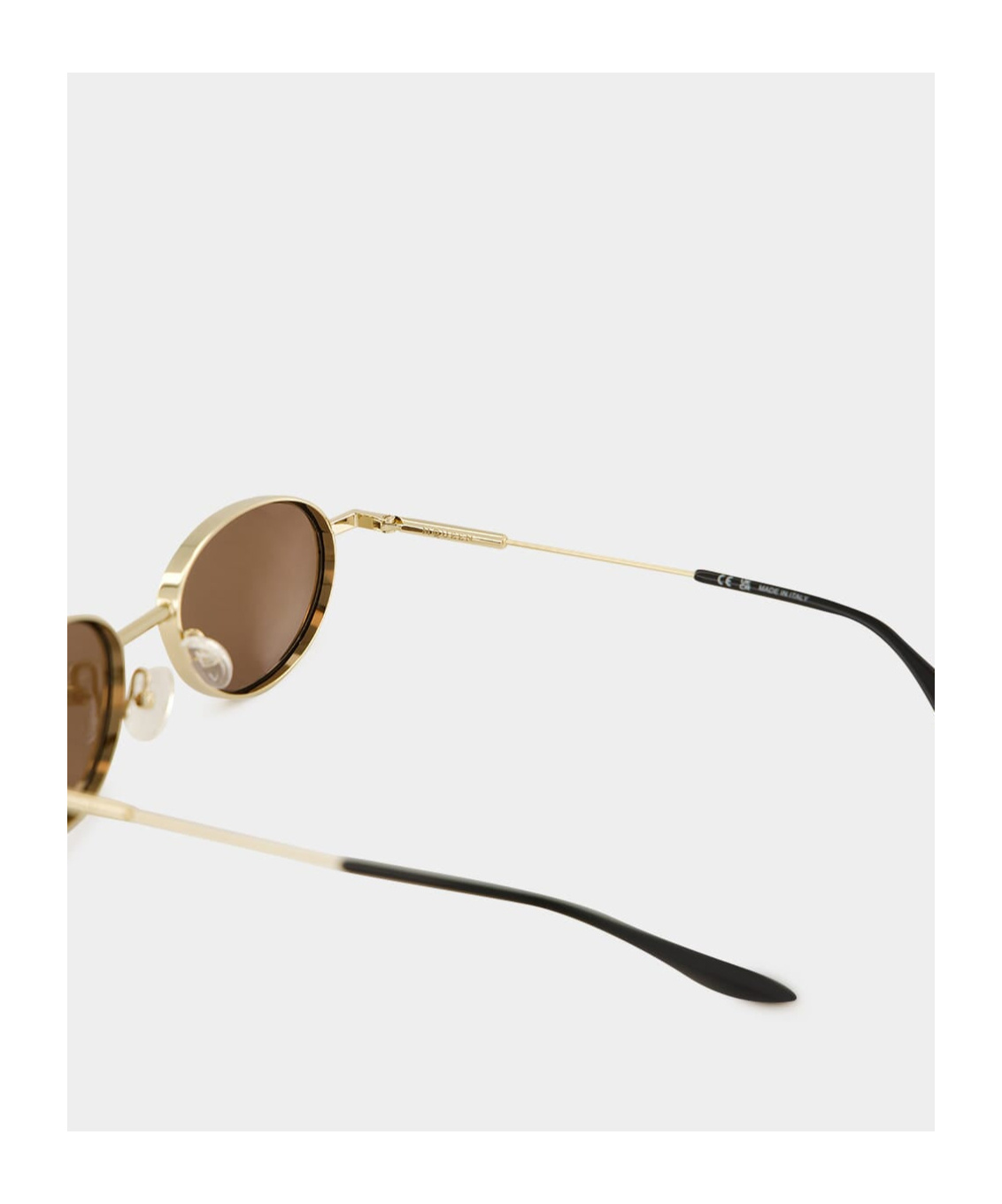 Alexander Mcqueen Eyewear Oval Frame Sunglasses In Gold