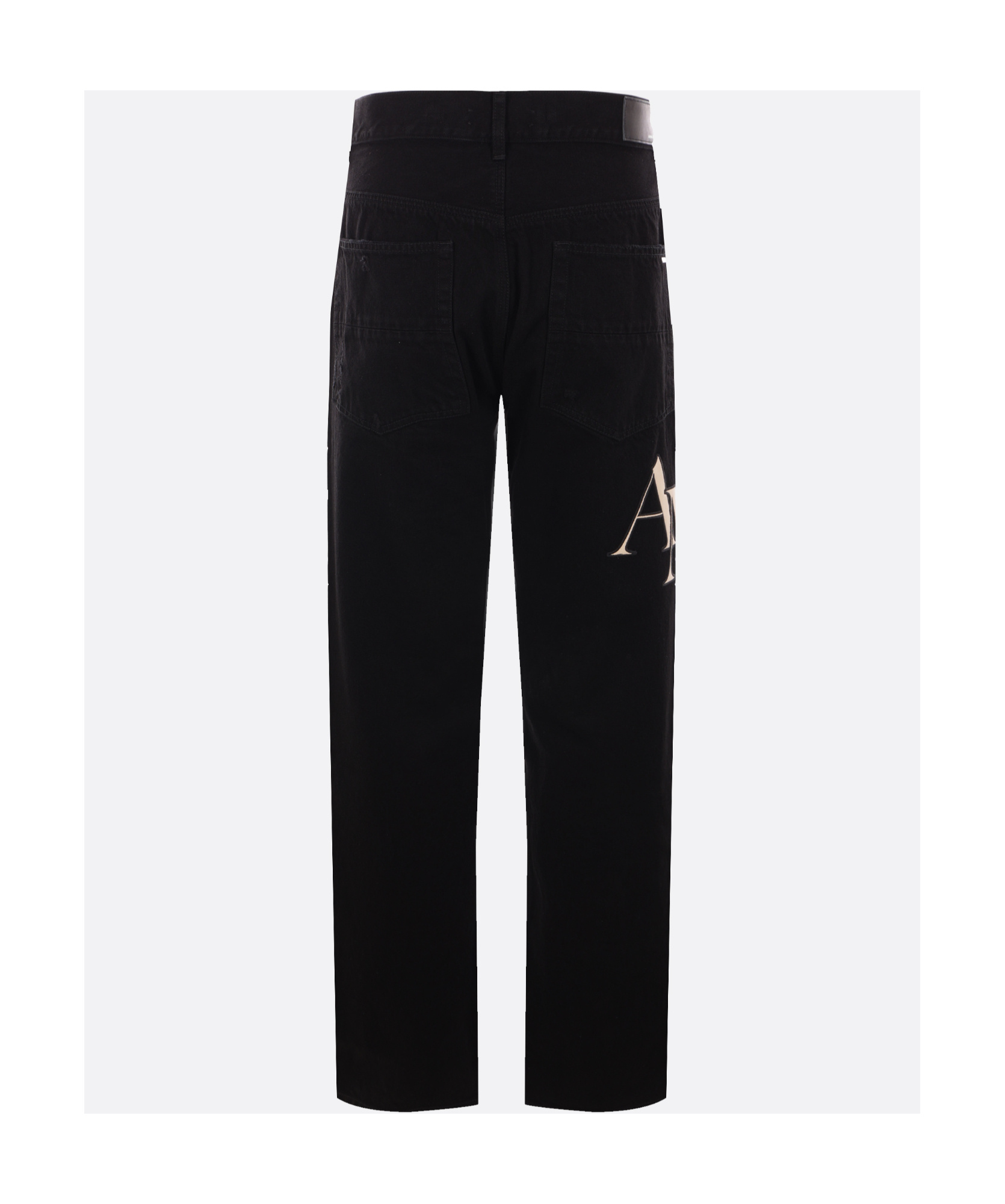 Amiri Staggered Logo Jeans In Black