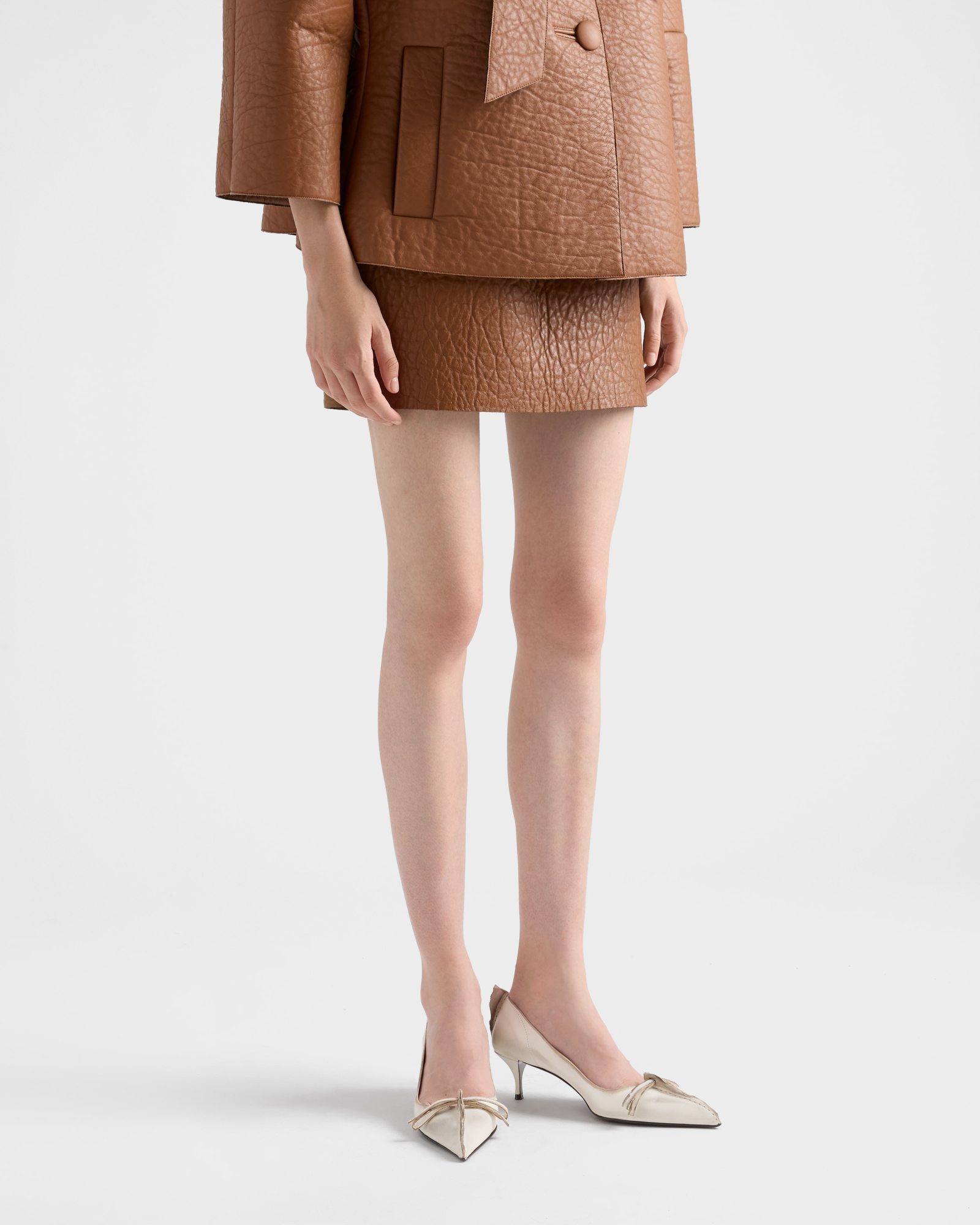 Prada Exposed Seam Kitten Heel Pump In Neutral