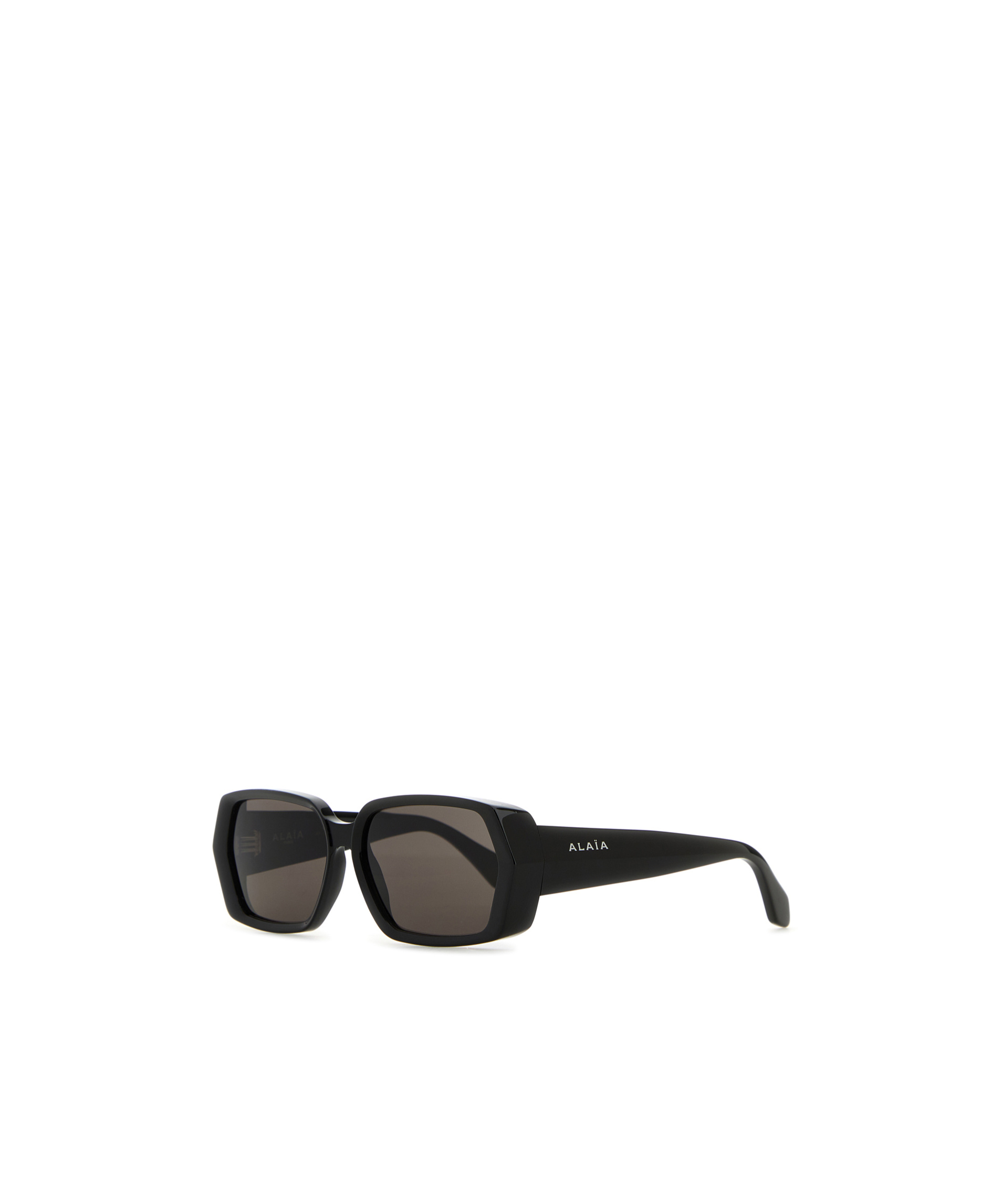 Shop Alaïa Geometrically Framed Sunglasses In Black