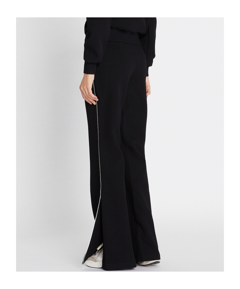 Shop Tory Burch Striped Flared Trousers In Black
