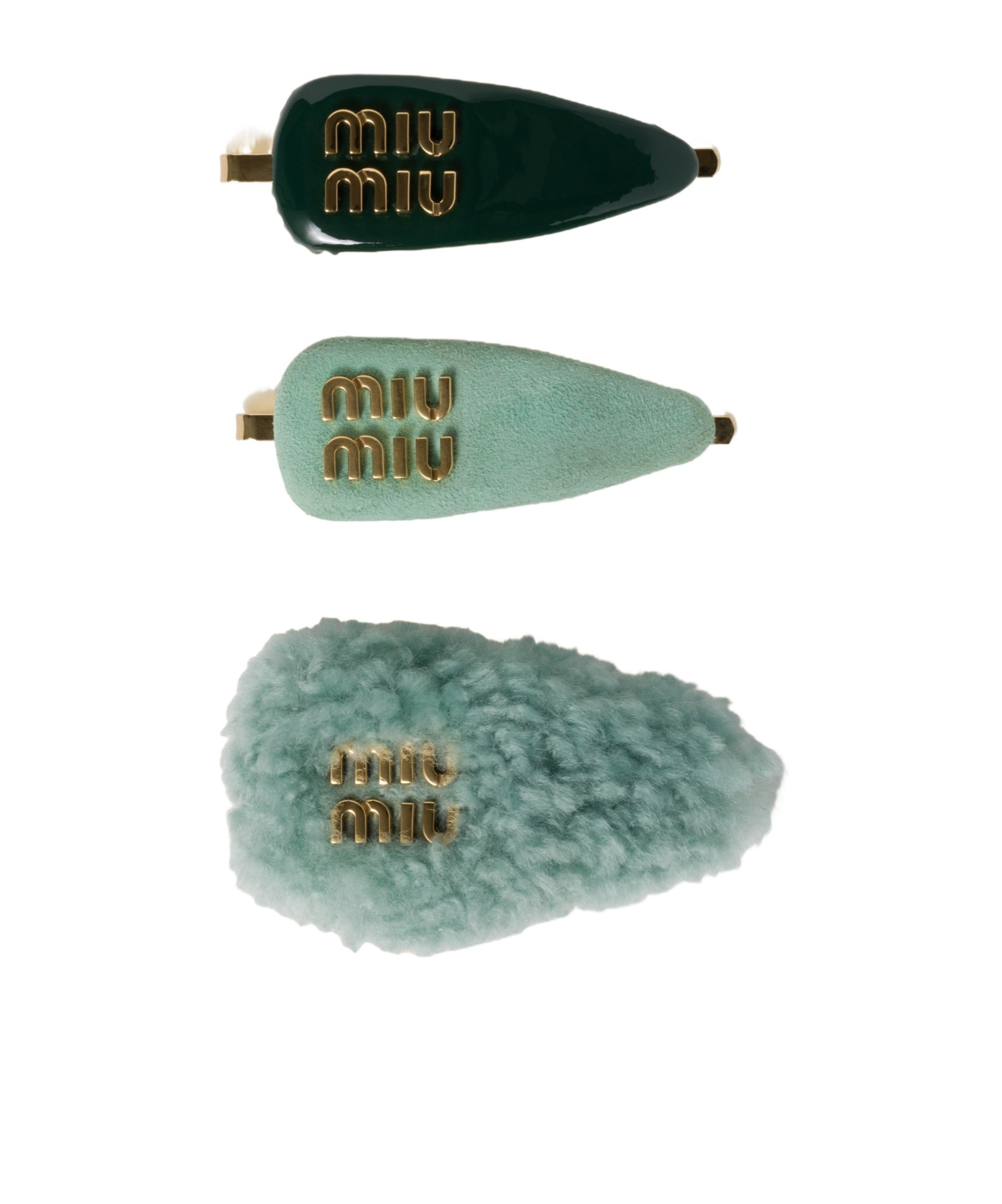 MIU MIU SET OF LEATHER, SUEDE, AND SHEARLING HAIR CLIPS