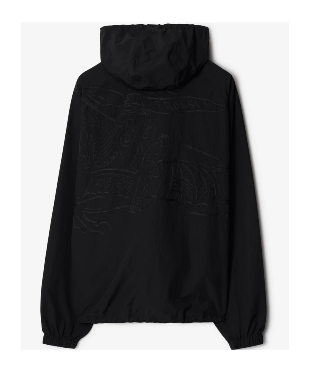 Burberry Logo Embossed Drawstring Jacket In Black