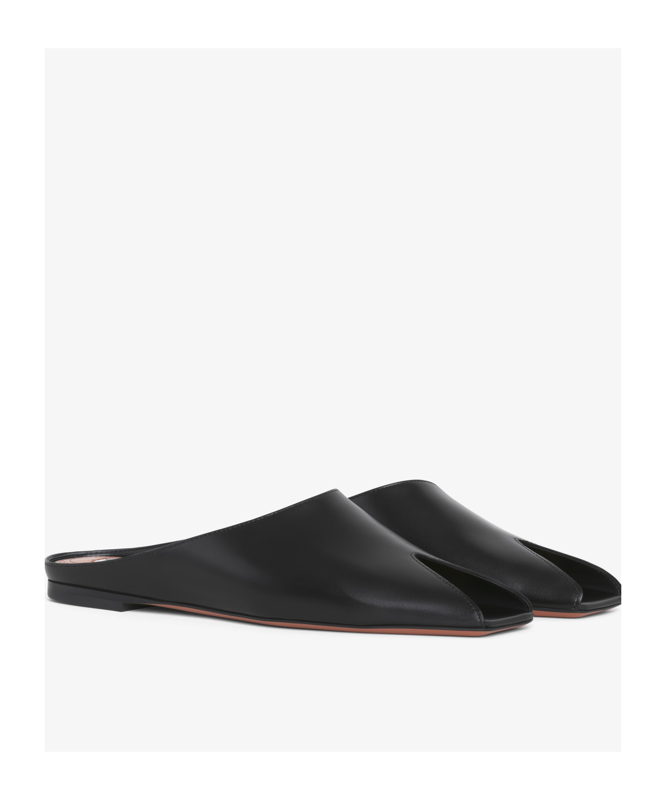 Alaïa Spike Leather Slippers In Black