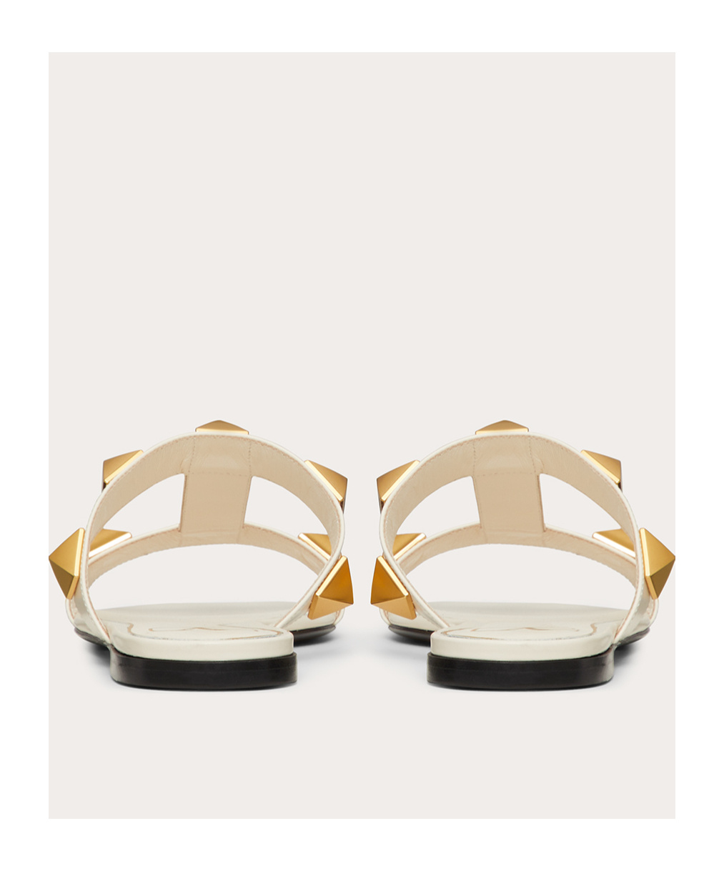 VALENTINO GARAVANI FLAT ROMAN STUD CALFSKIN SLIDE SANDAL