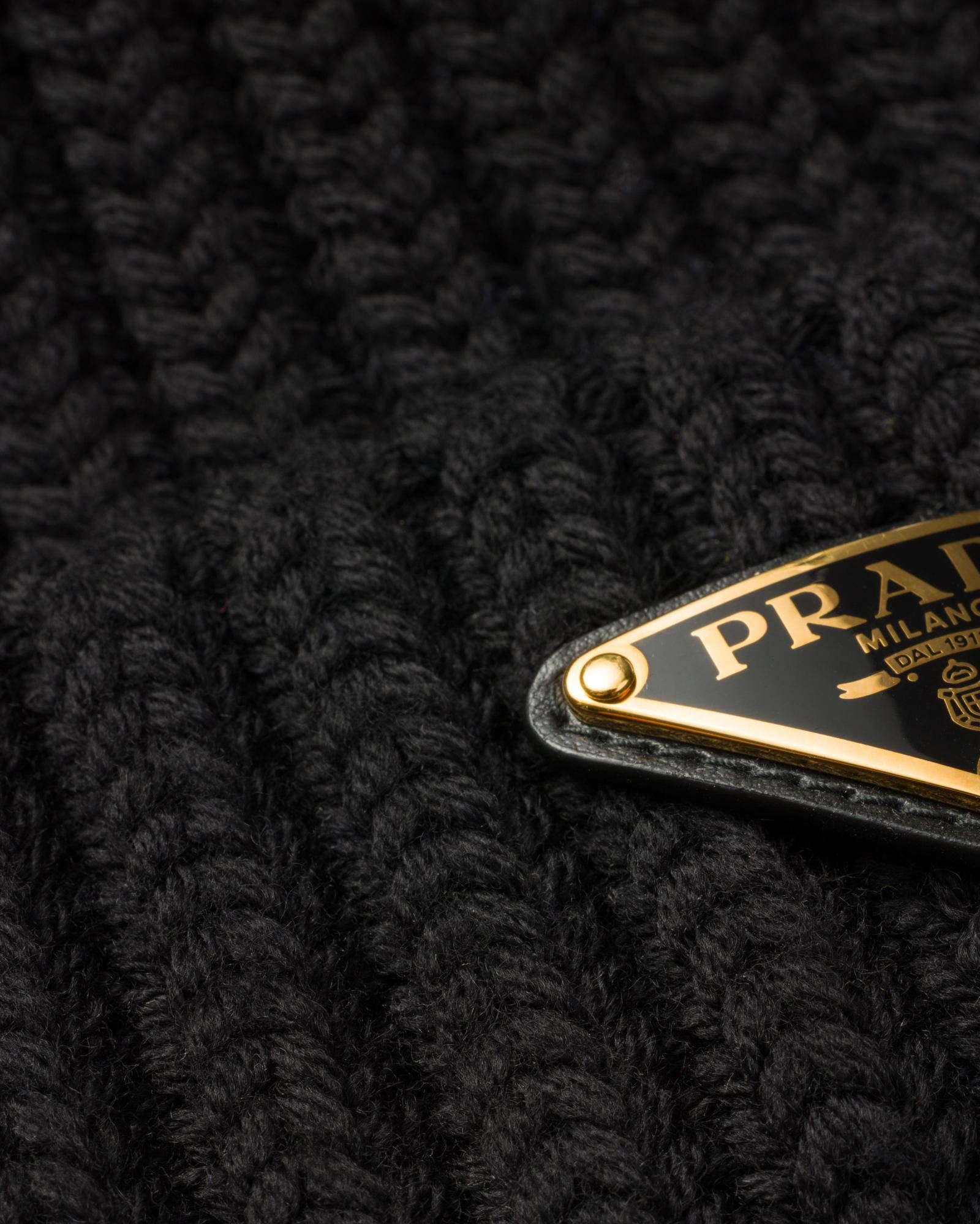 Prada Triangle-logo Ribbed Beanie In Black