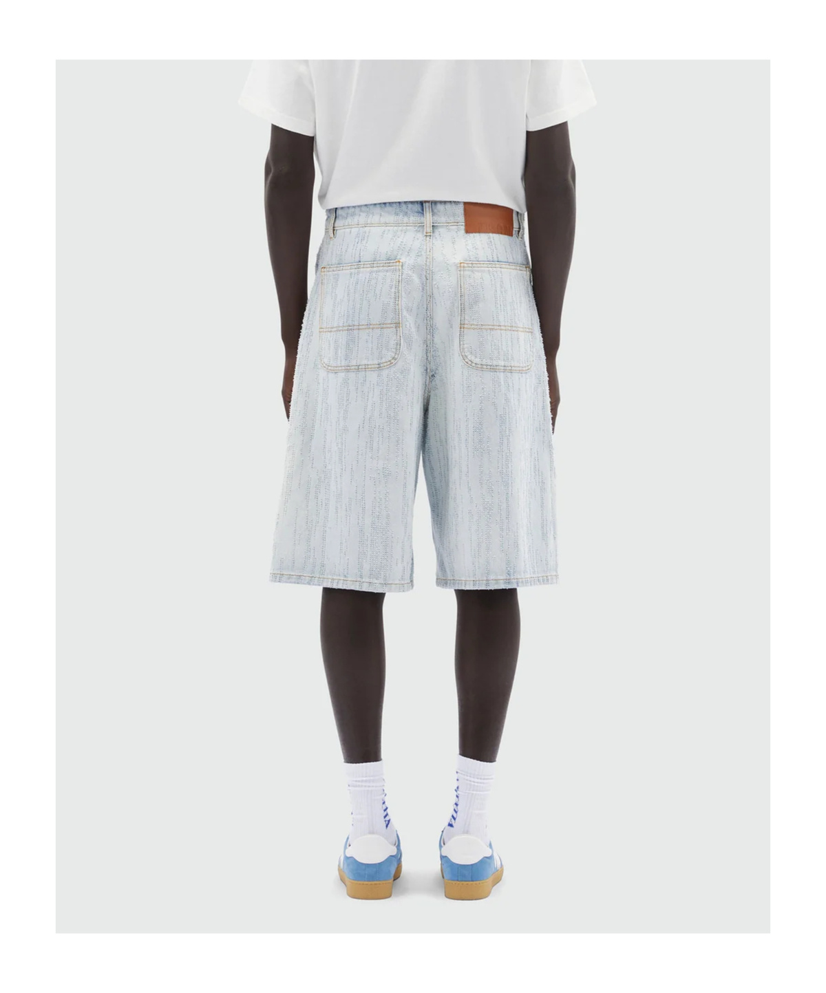 Msgm Bermuda Shorts In Light Denim With A Destroyed Effect In White