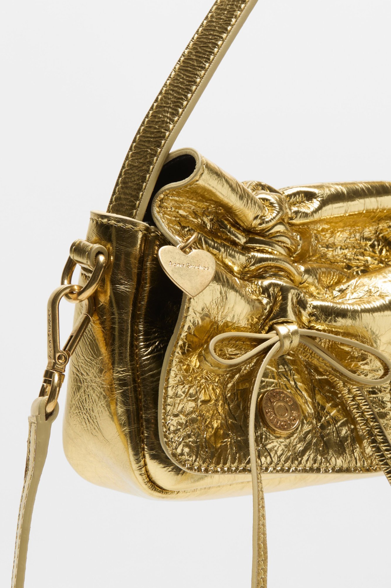 Acne Studios Drawstring Leather Shoulder Bag In Gold