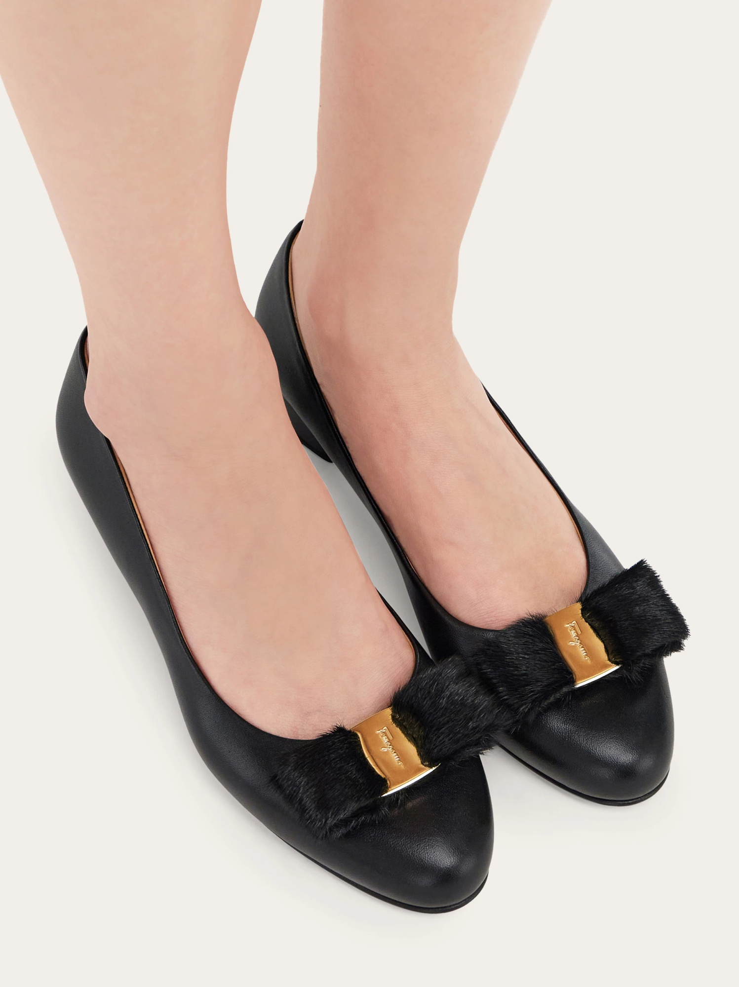 Ferragamo Vara Genuine Shearling Bow Pump In Black
