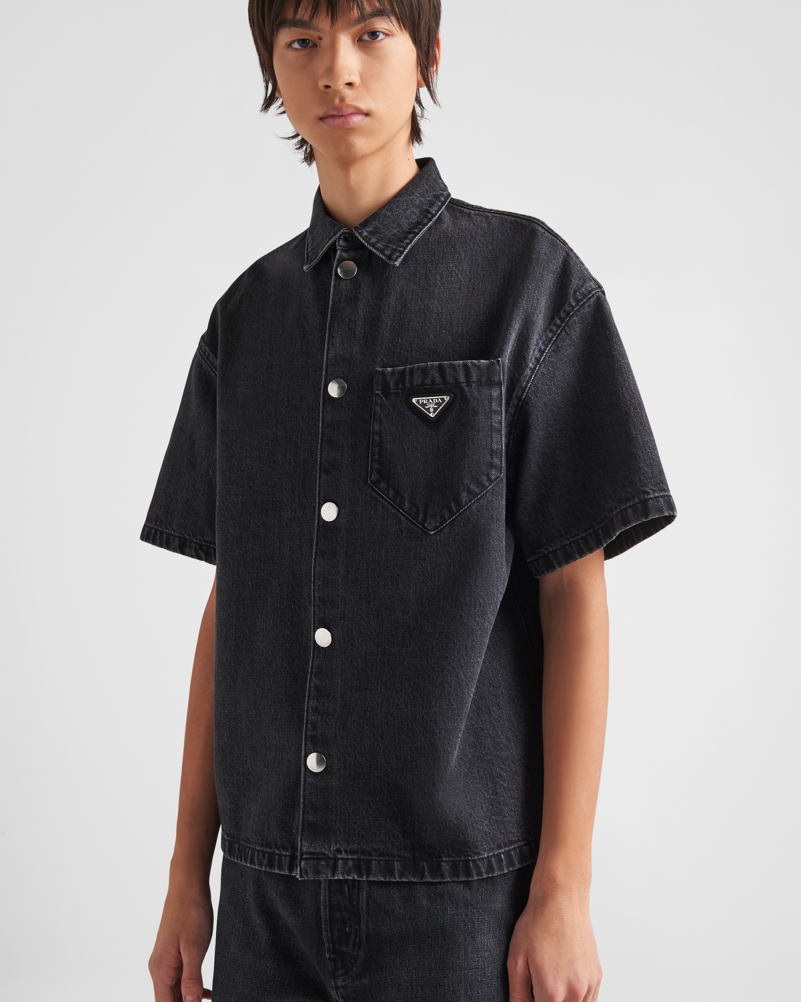 Prada Logo Plaque Short Sleeved Denim Shirt In Black