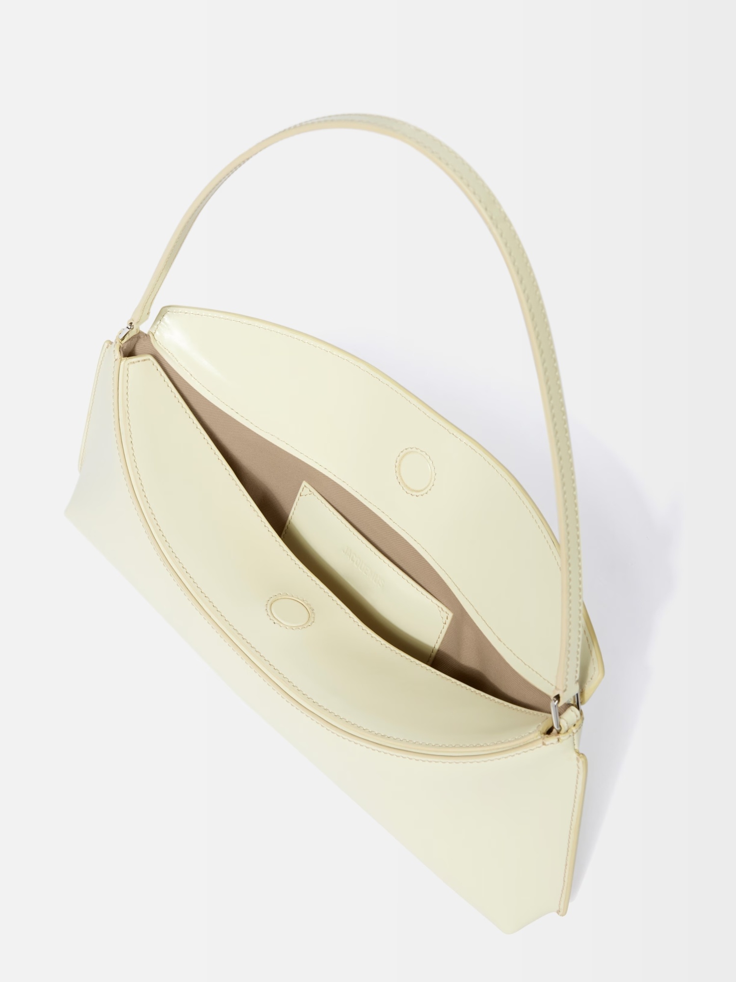 Jacquemus The Ovalo Clutch In Neutral