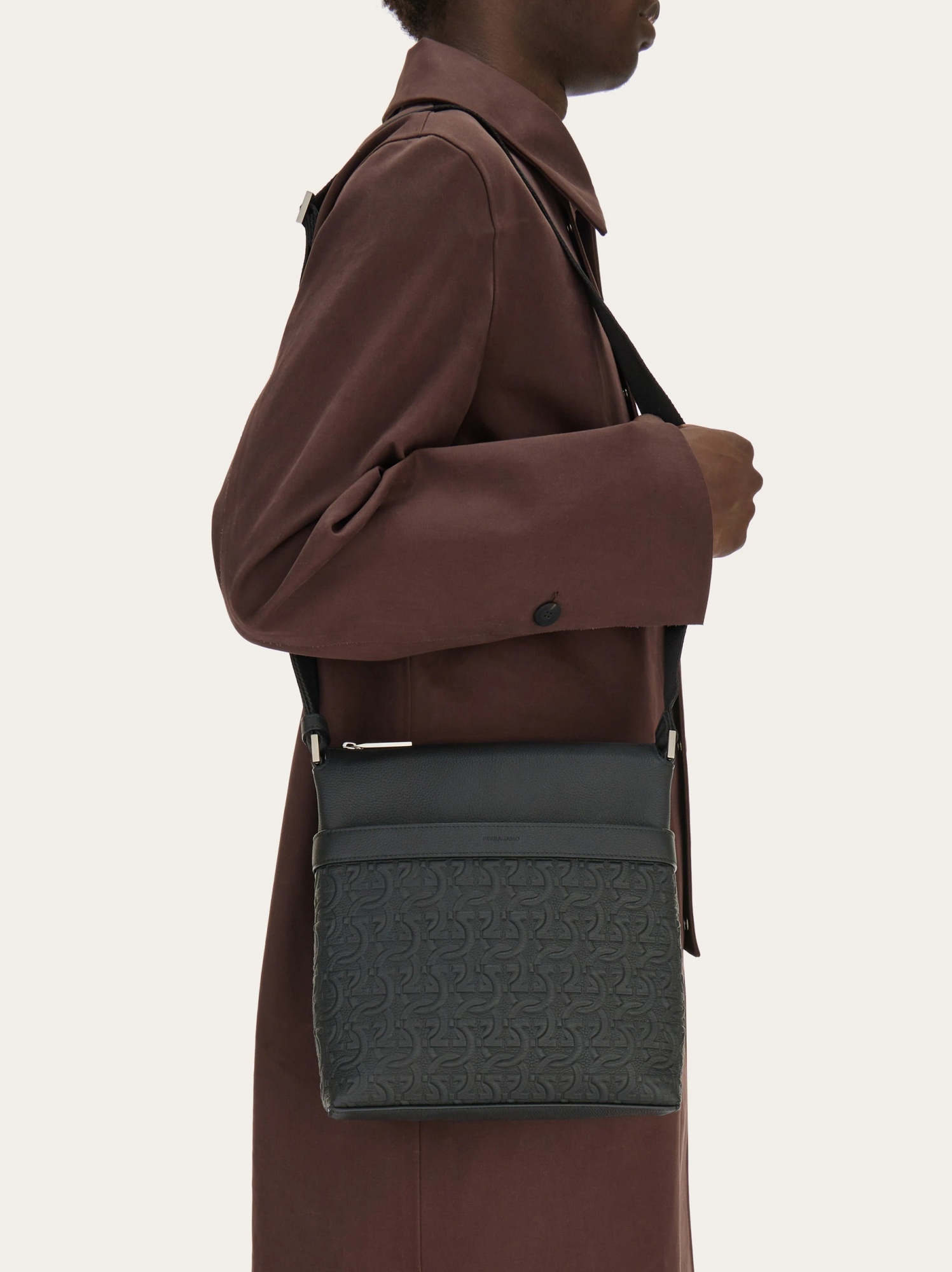 Ferragamo Gancini Pattern Leather Crossbody Bag In Black