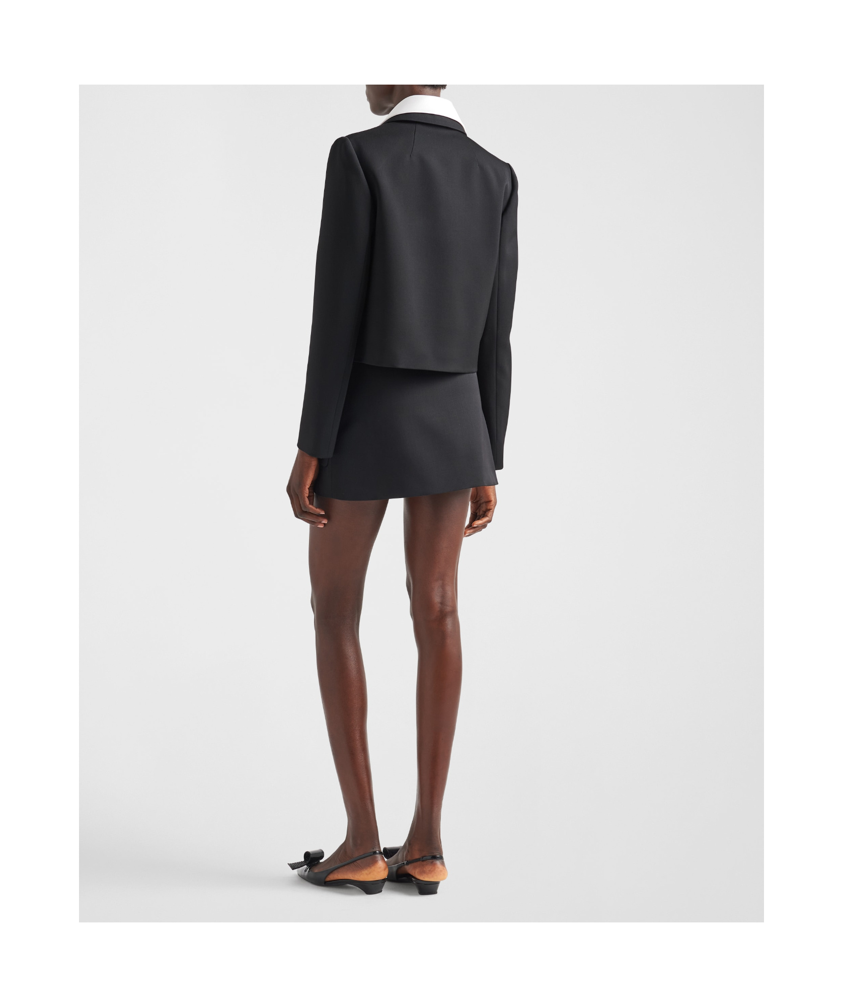 Prada Wool Mini Skirt With Oversized Pockets And Embellished Accents In Black