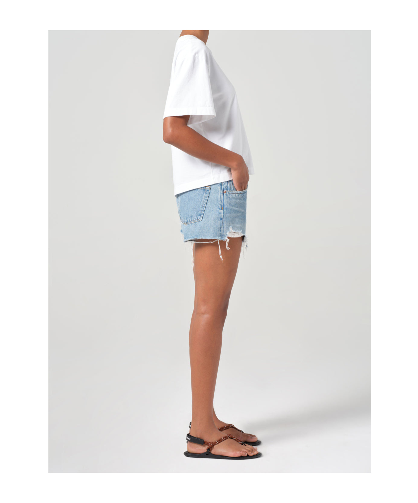 Shop Agolde Ripped Denim Shorts