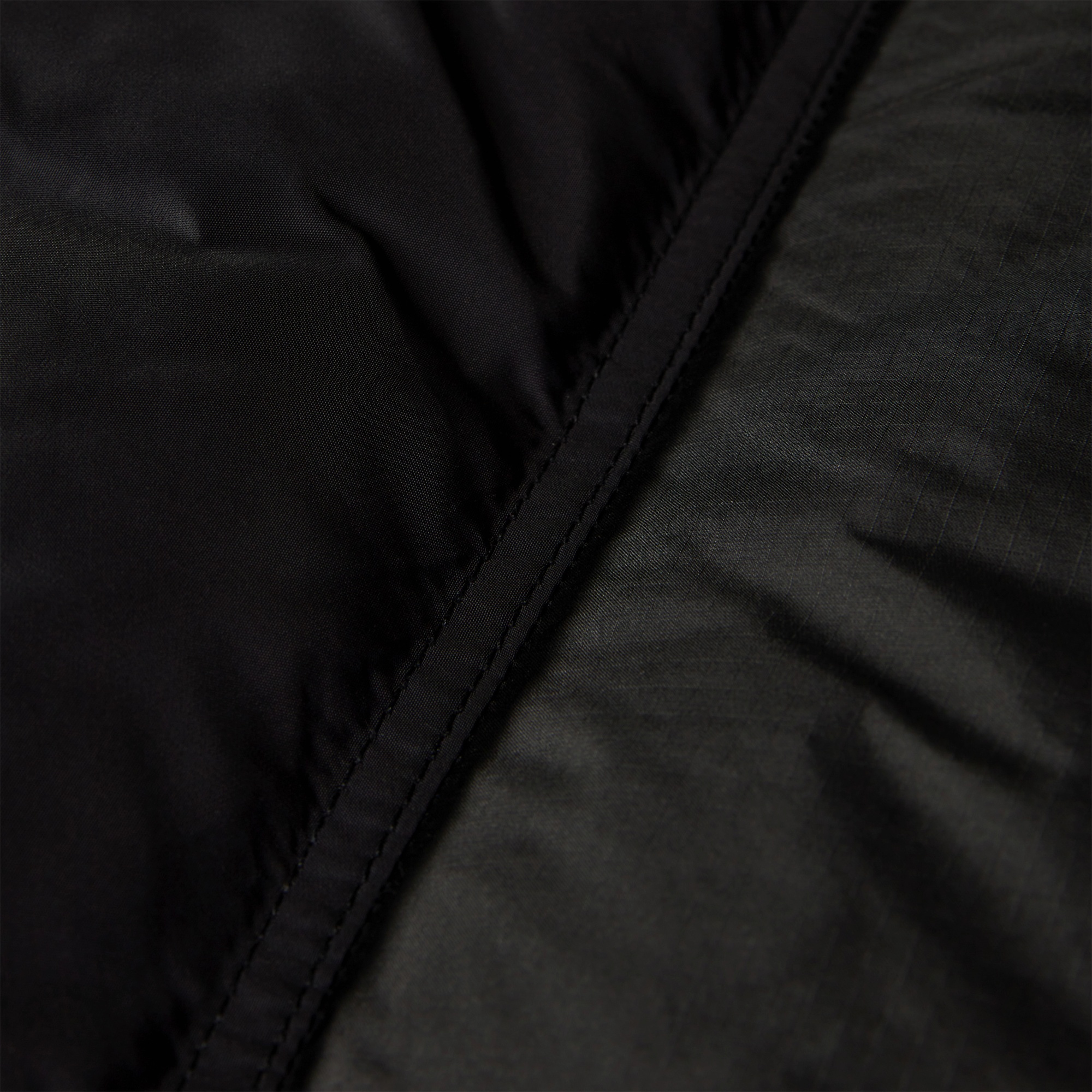 The North Face Long Parker Down Jacket In Black