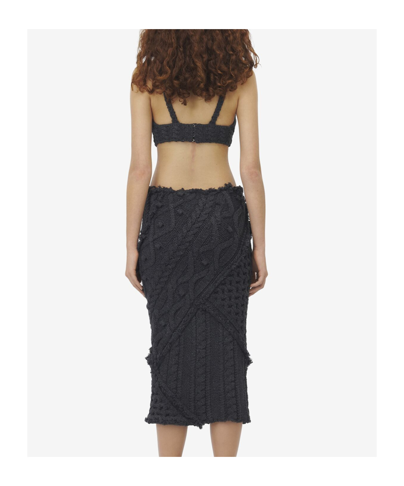 Alexander Mcqueen Twisted Knitted Corset In Black