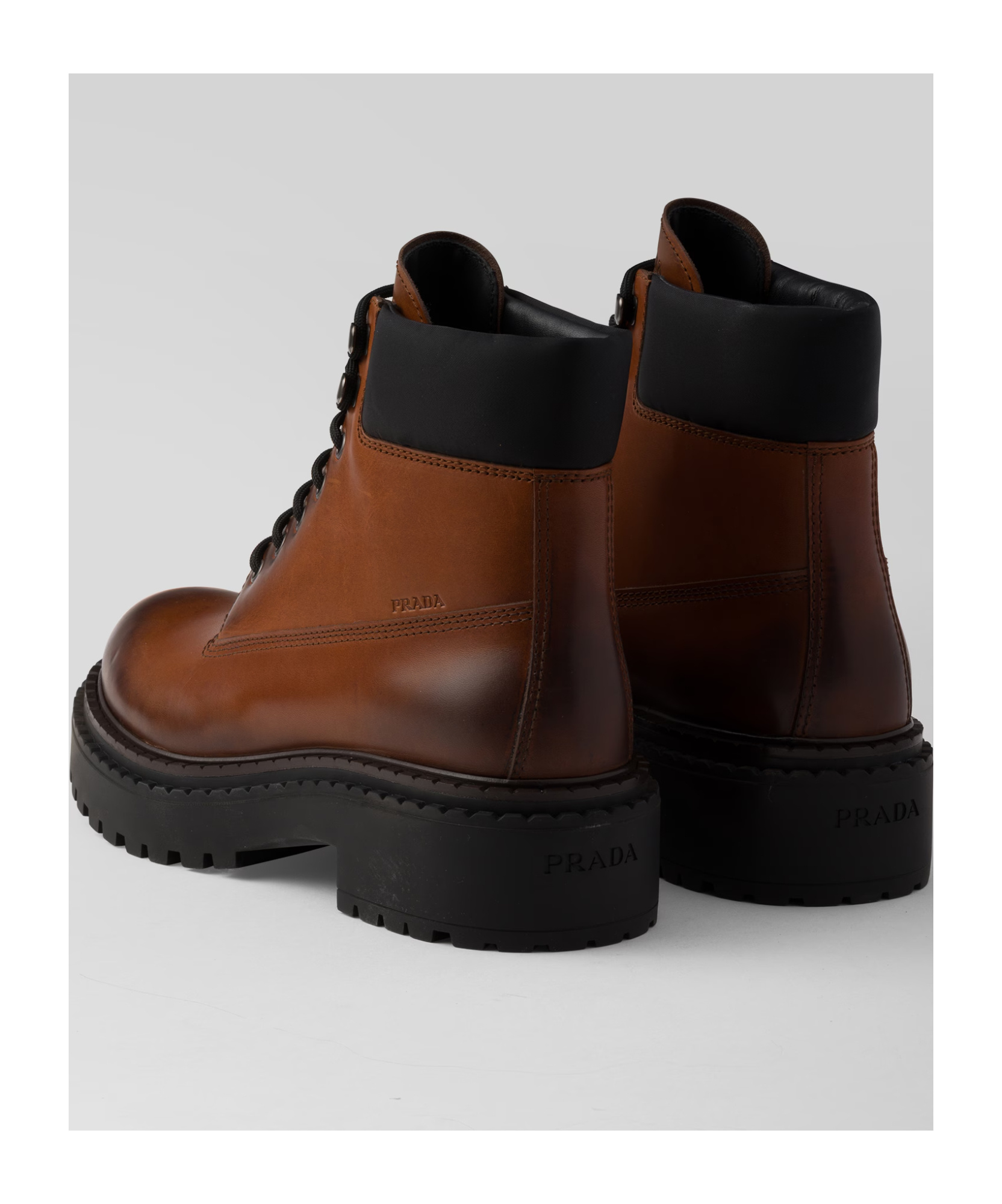 Prada Hot Stamping Logo Boots In Brown