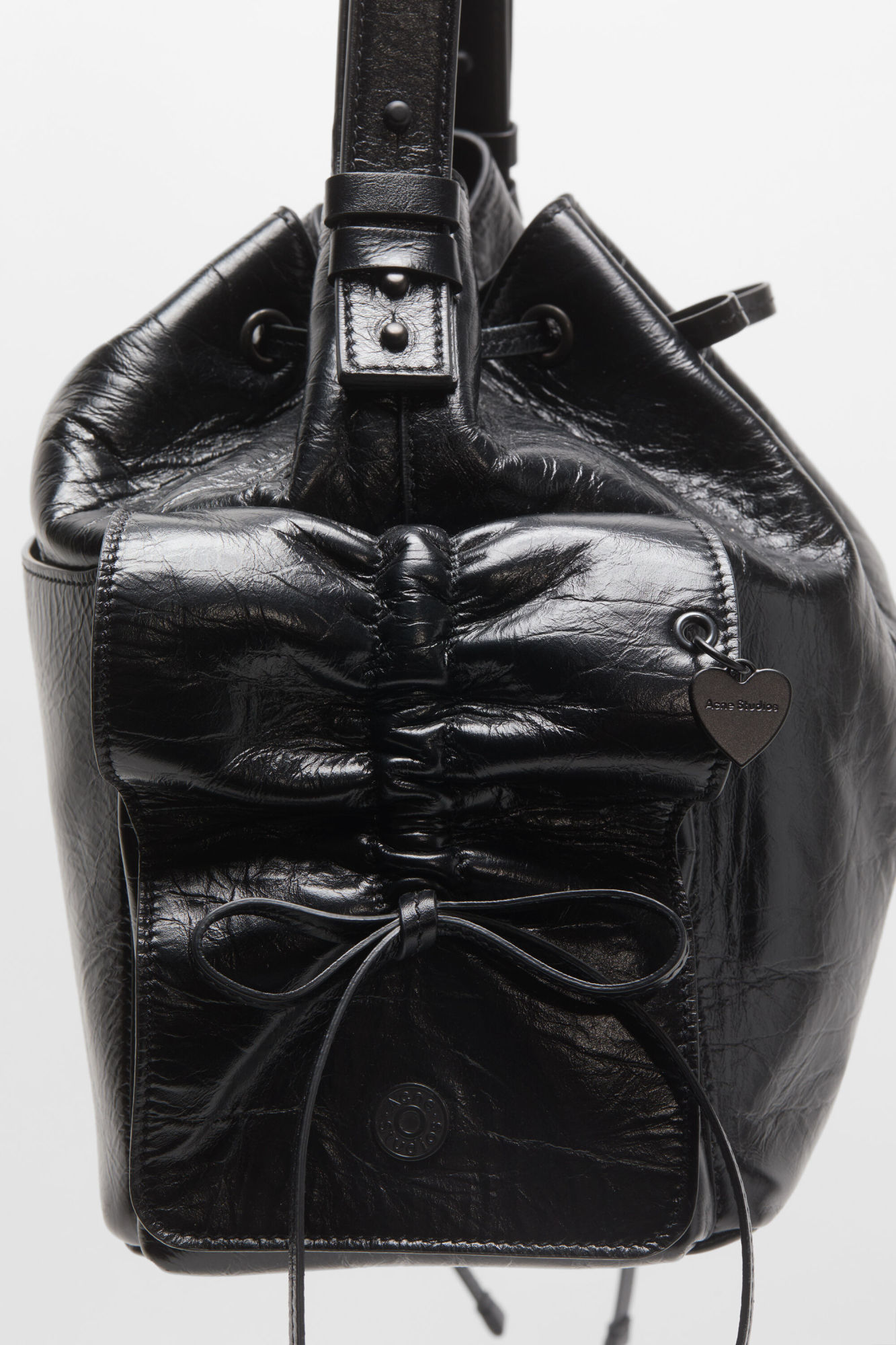 Acne Studios Drawstring Ruffled Leather Shoulder Bag In Black