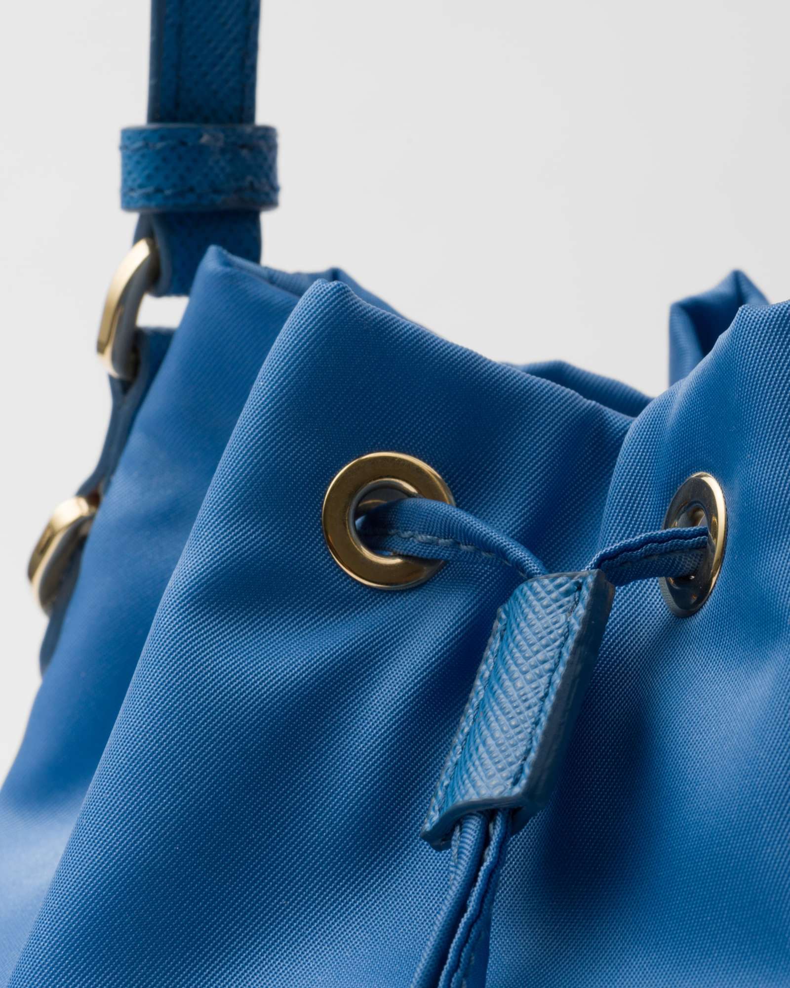 Prada Re-edition 1978 Re-nylon Mini Recycled-polyamide Bucket Bag In Blue