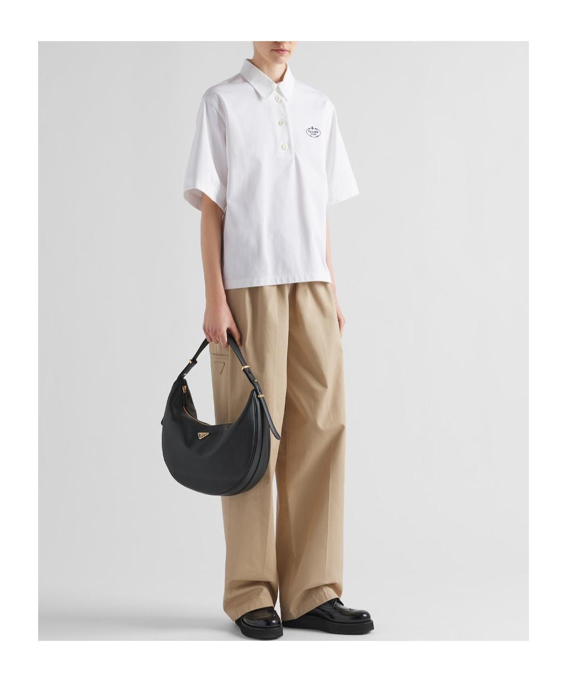 Prada Rounded Shoulder Bag With Gold-tone Hardware In Black