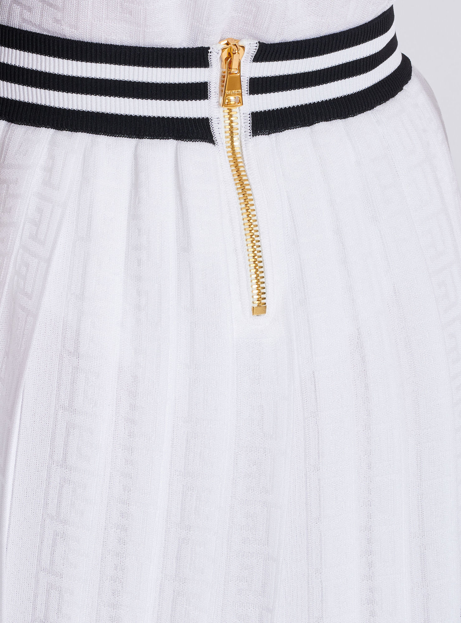Balmain Pleated Monogrammed Knit Skirt In White