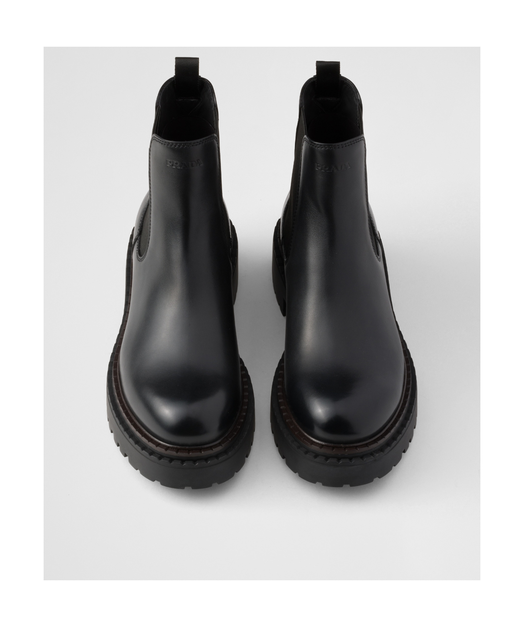 Shop Prada Leather Chelsea Boots In Black