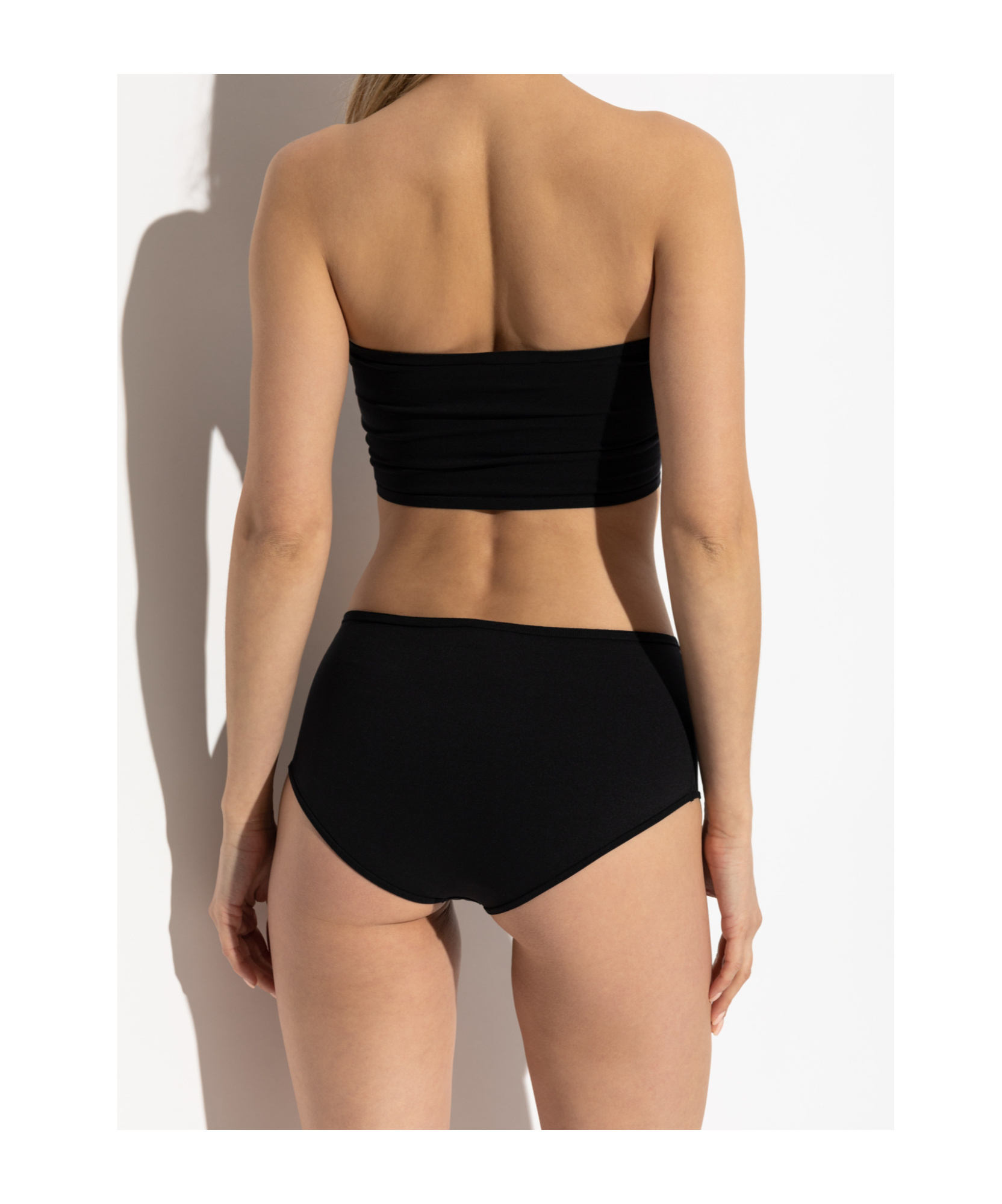 Alaïa Strapless Bandeau Top And High-waisted Bottoms Set In Black
