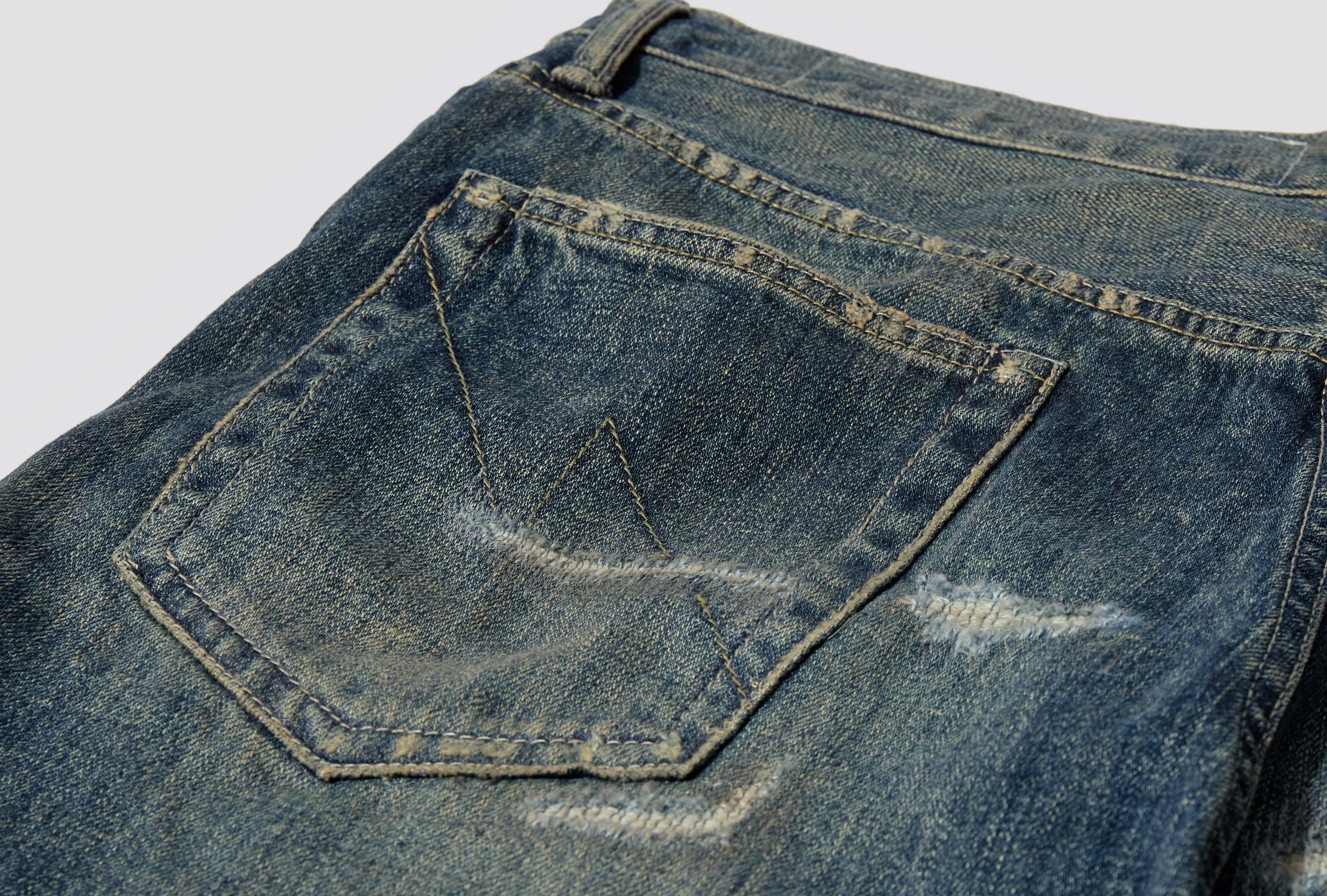 NEIGHBORHOOD PIERCED JEANS
