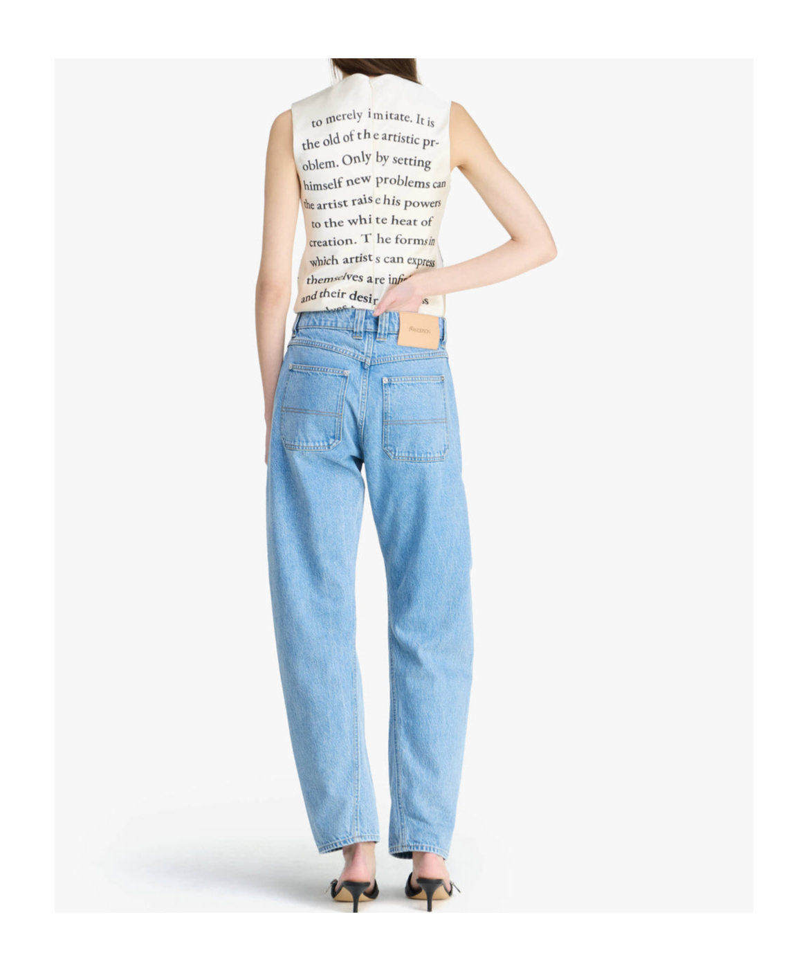 Jw Anderson Twisted Slim-fit Jeans In Blue