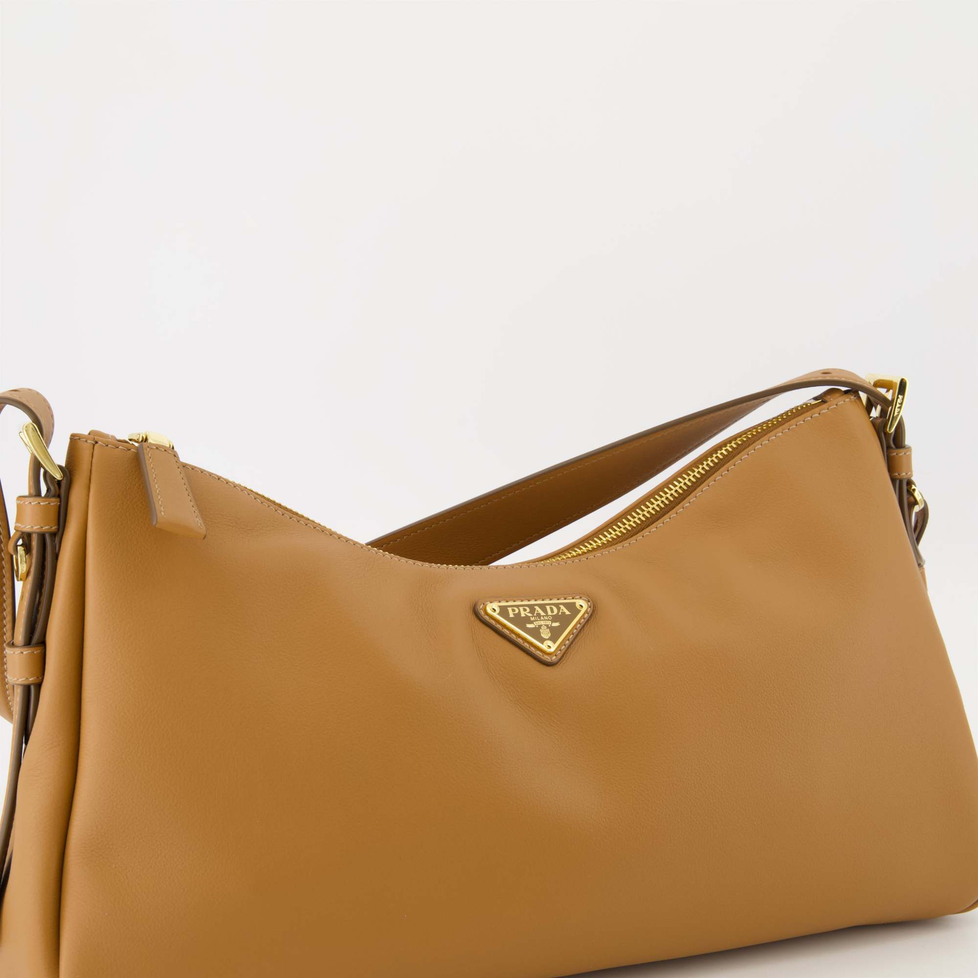 Prada Triangle-logo Zipped Shoulder Bag In Brown