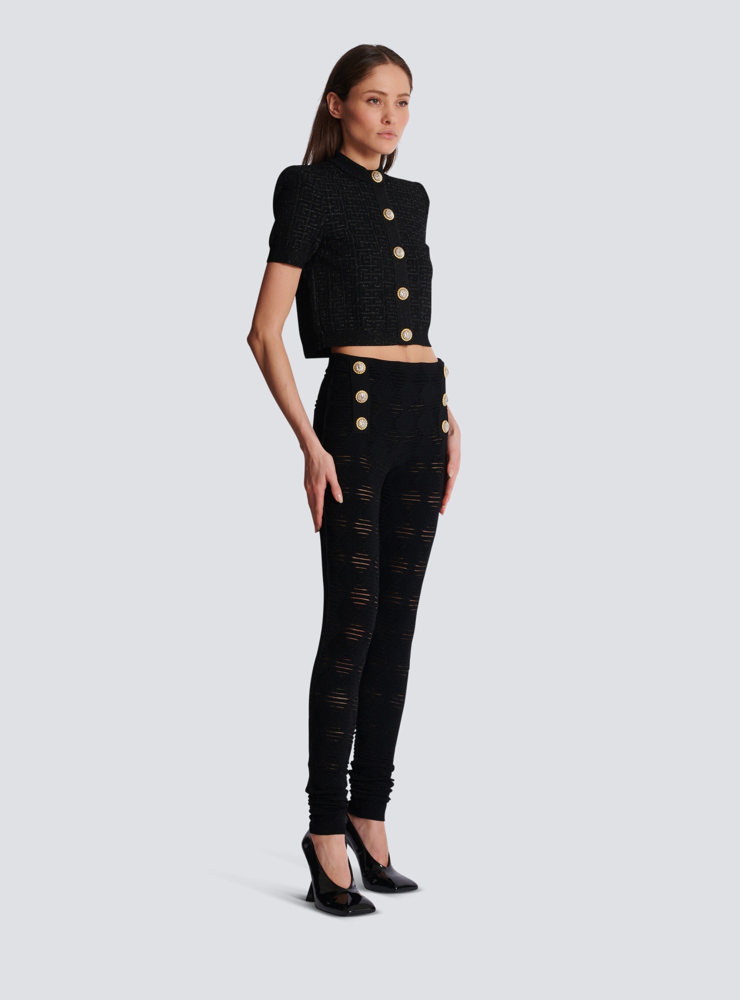 Balmain Embossed-button Open-knit Leggings In Black