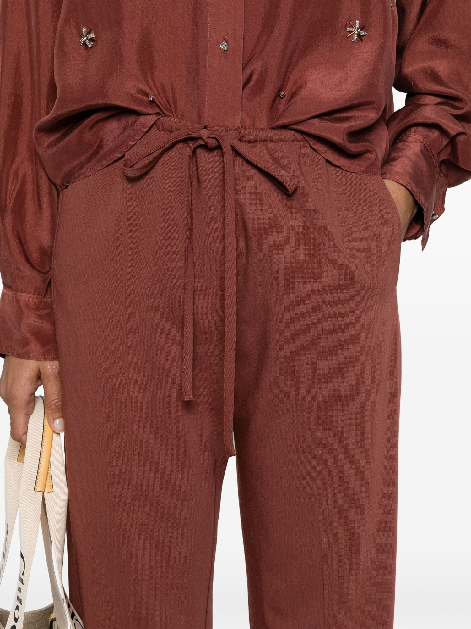 FORTE FORTE PRESSED-CREASE TAPERED-LEG TROUSERS