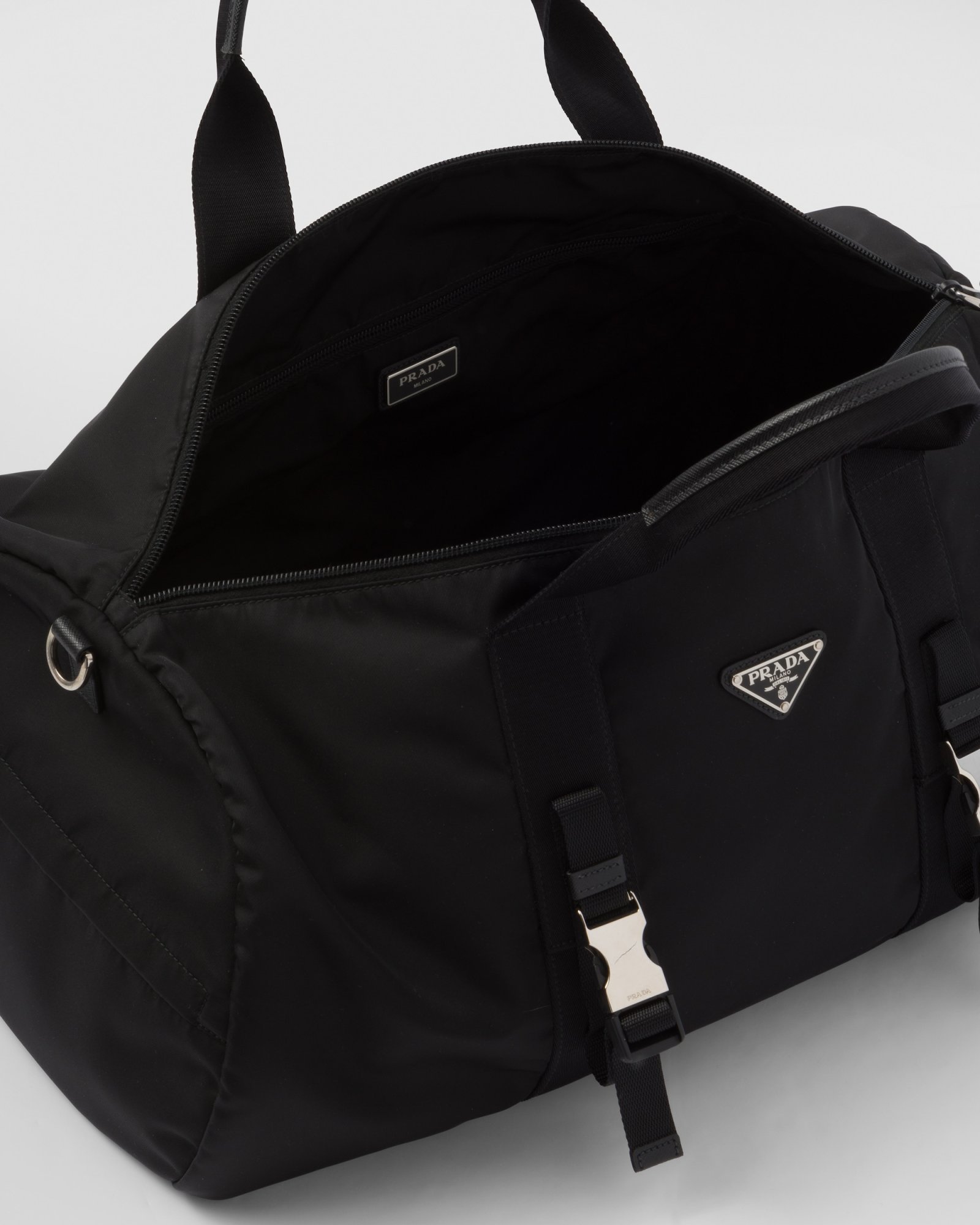 Prada Duffle Bag In Technical Nylon With Triangular Logo In Black