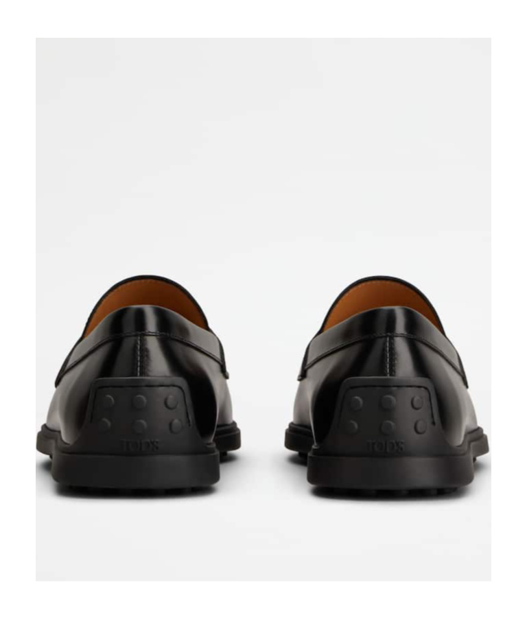 Tod's Slip On Loafers In Black