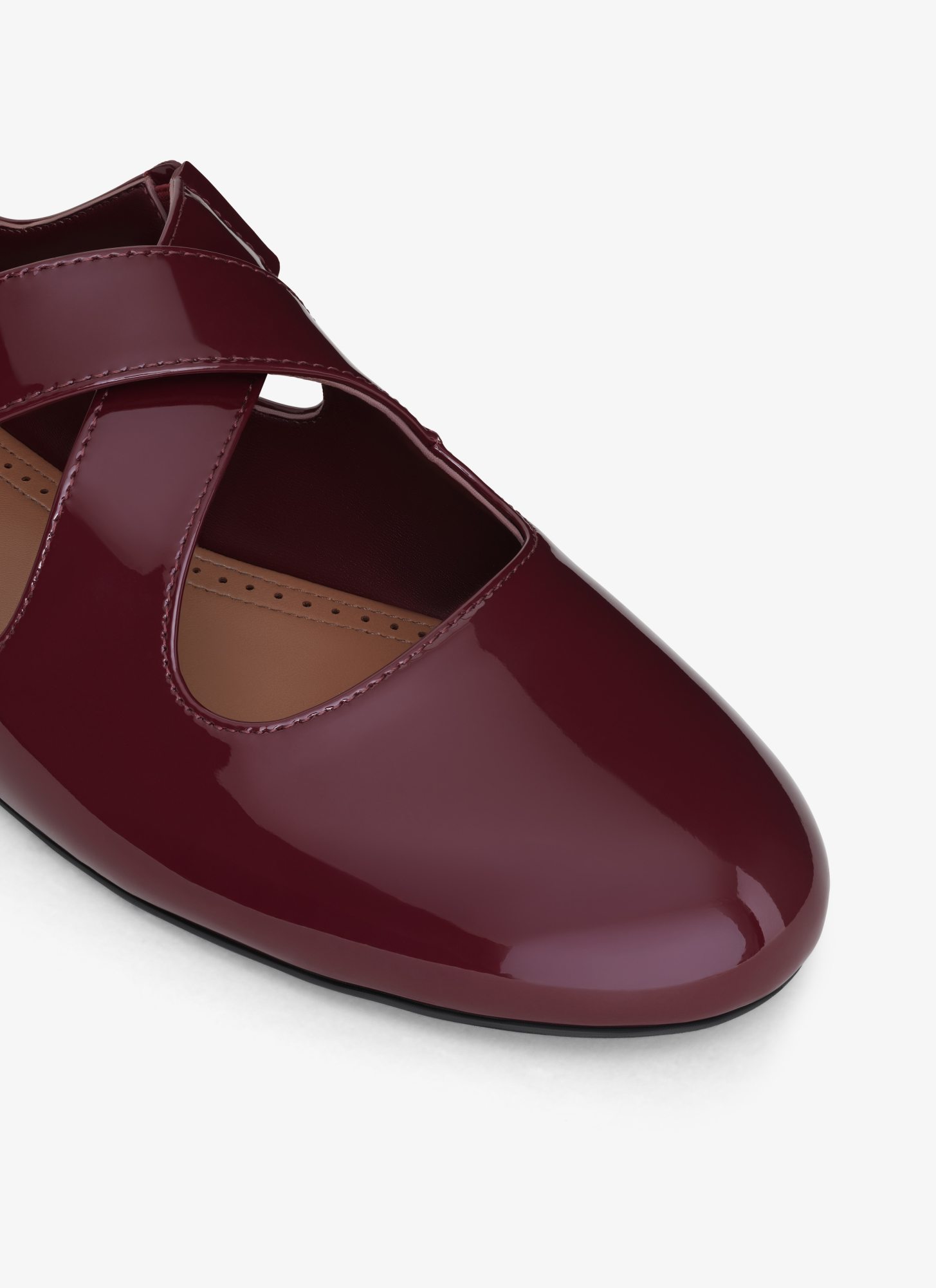 Alaïa Crossed Ballet Flats In Burgundy