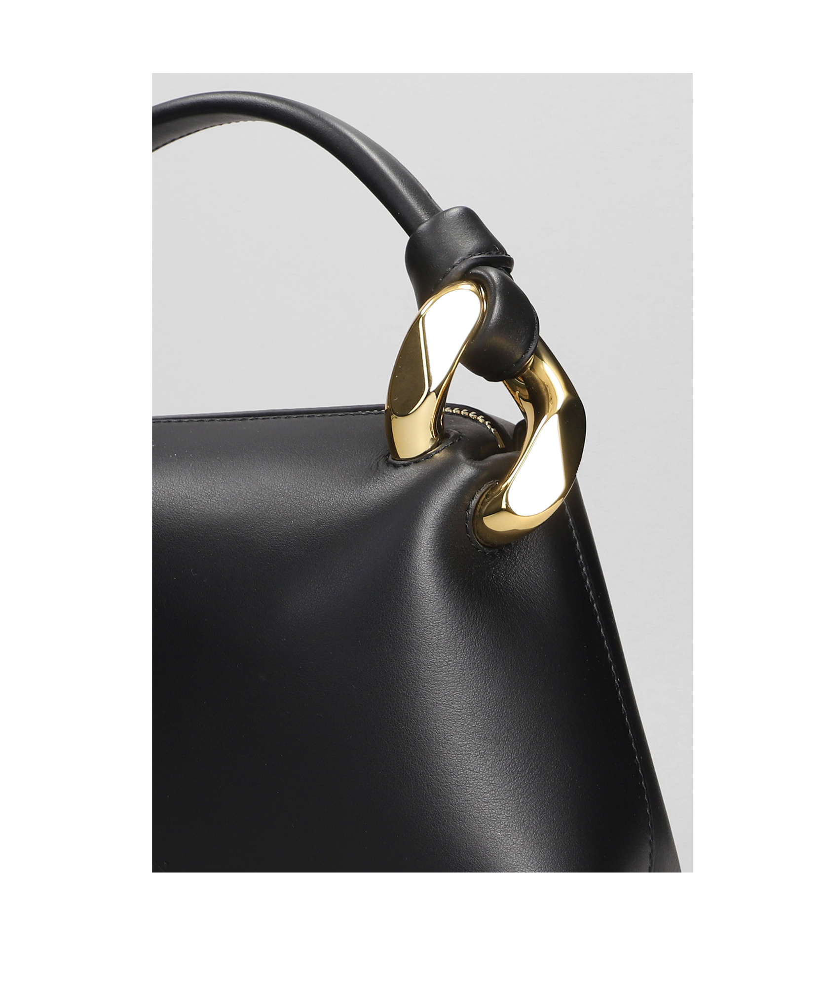 Jw Anderson Logo Debossed Top Handle Bag In Black