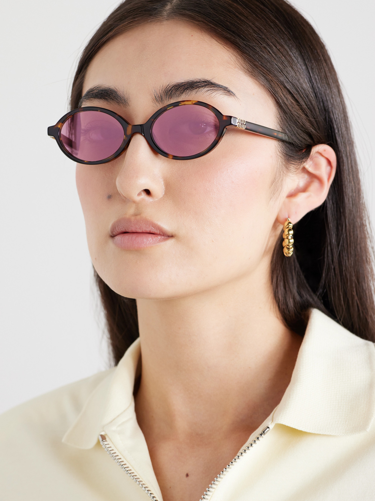Miu Miu Oval Frame Sunglasses In Pink
