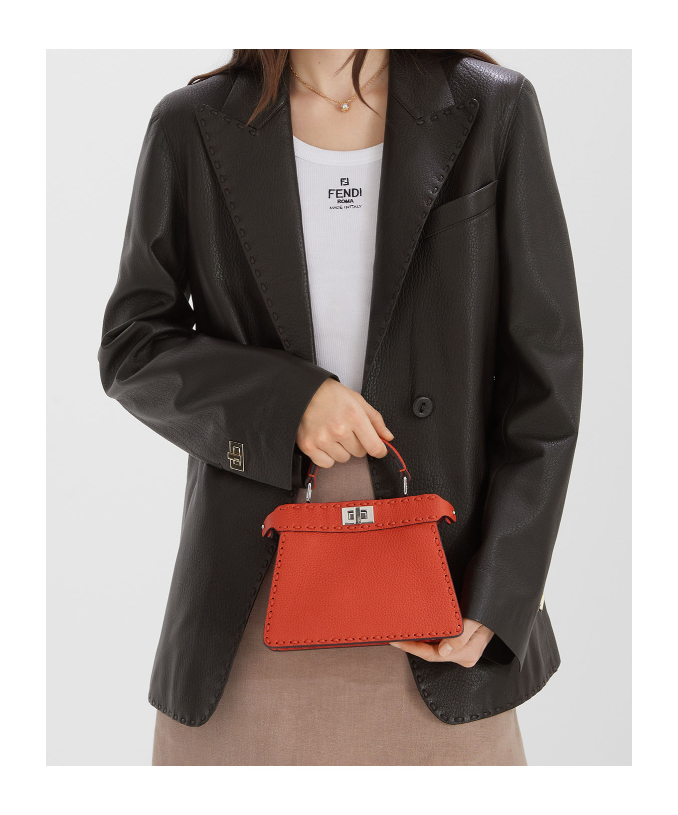 FENDI ORANGE SELLERIA BAG WITH 306 HAND-SEWN TOPSTITCHES