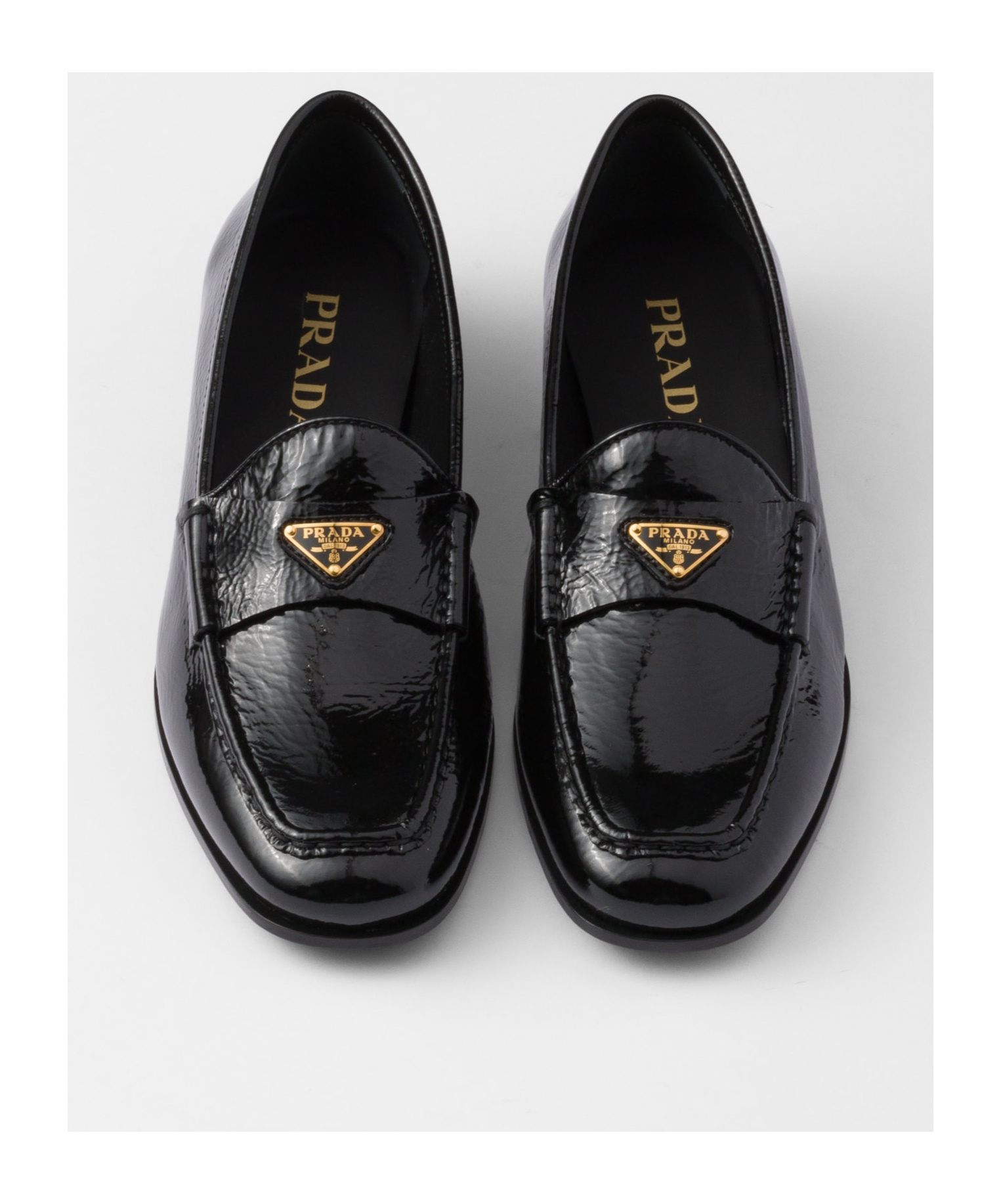 Prada Triangle Logo Patent Leather Loafers In Black