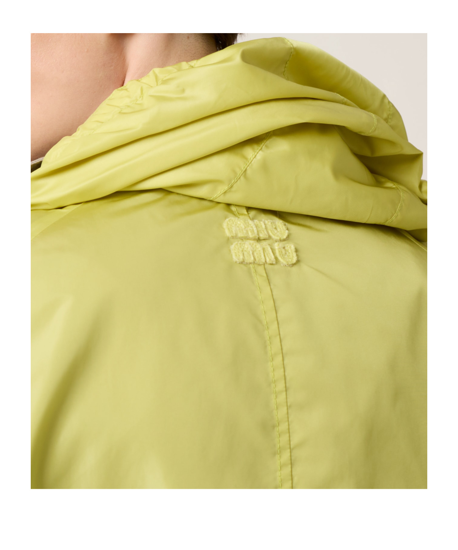Miu Miu Long-sleeved Hooded Casual Jacket In Yellow
