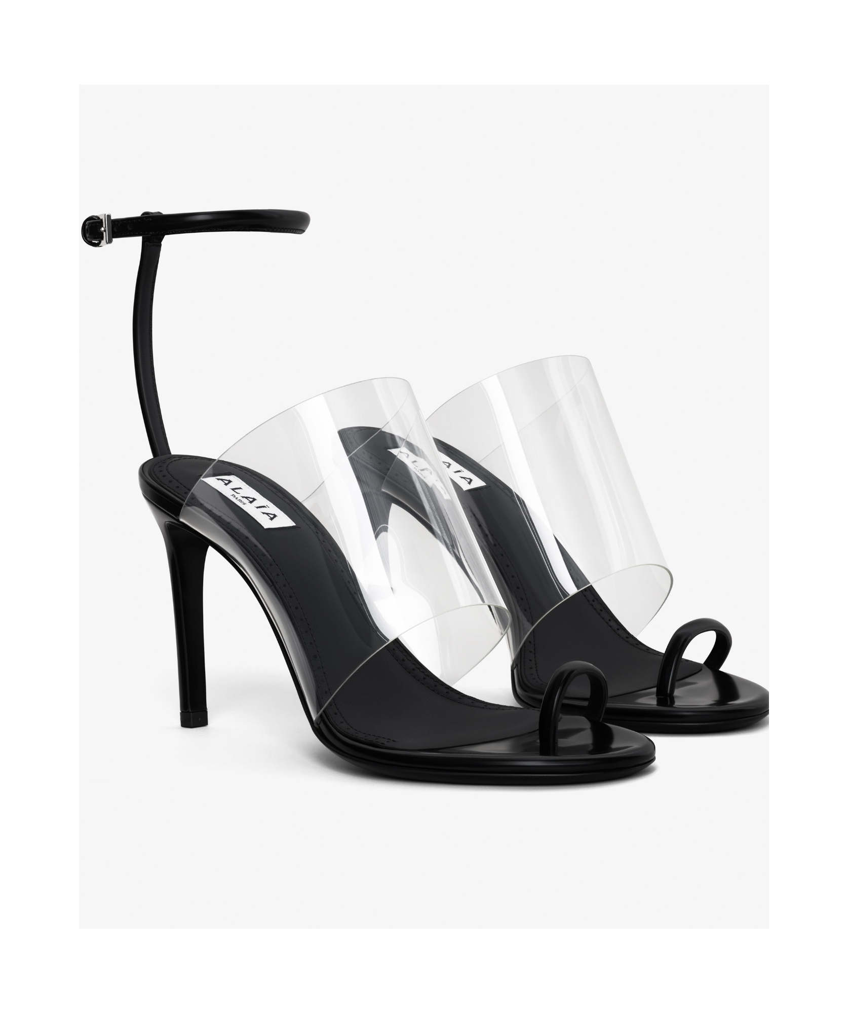 Shop Alaïa 100mm Asymmetric Mules In White