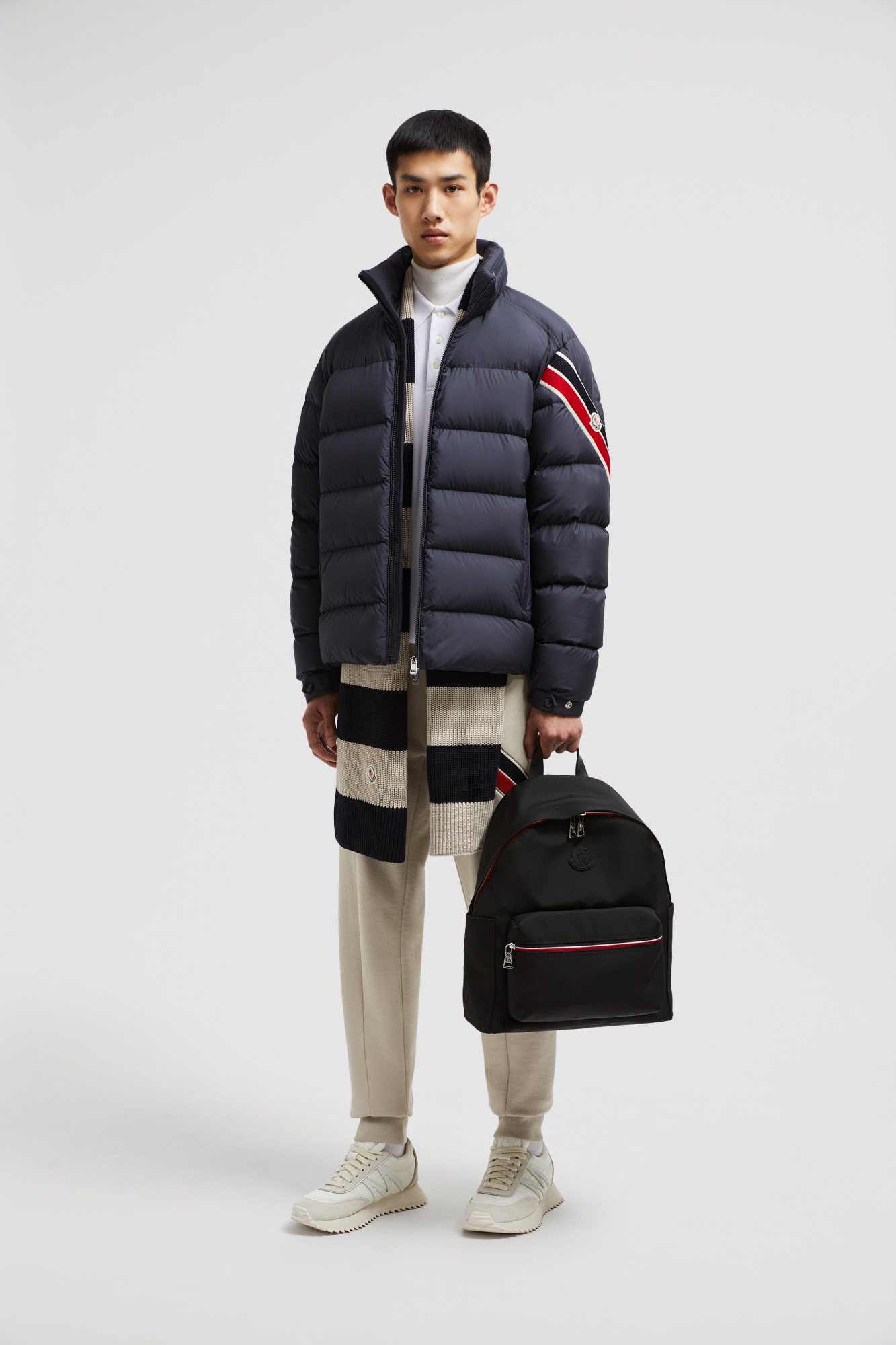 Moncler Striped Logo Patch Down Jacket In Blue