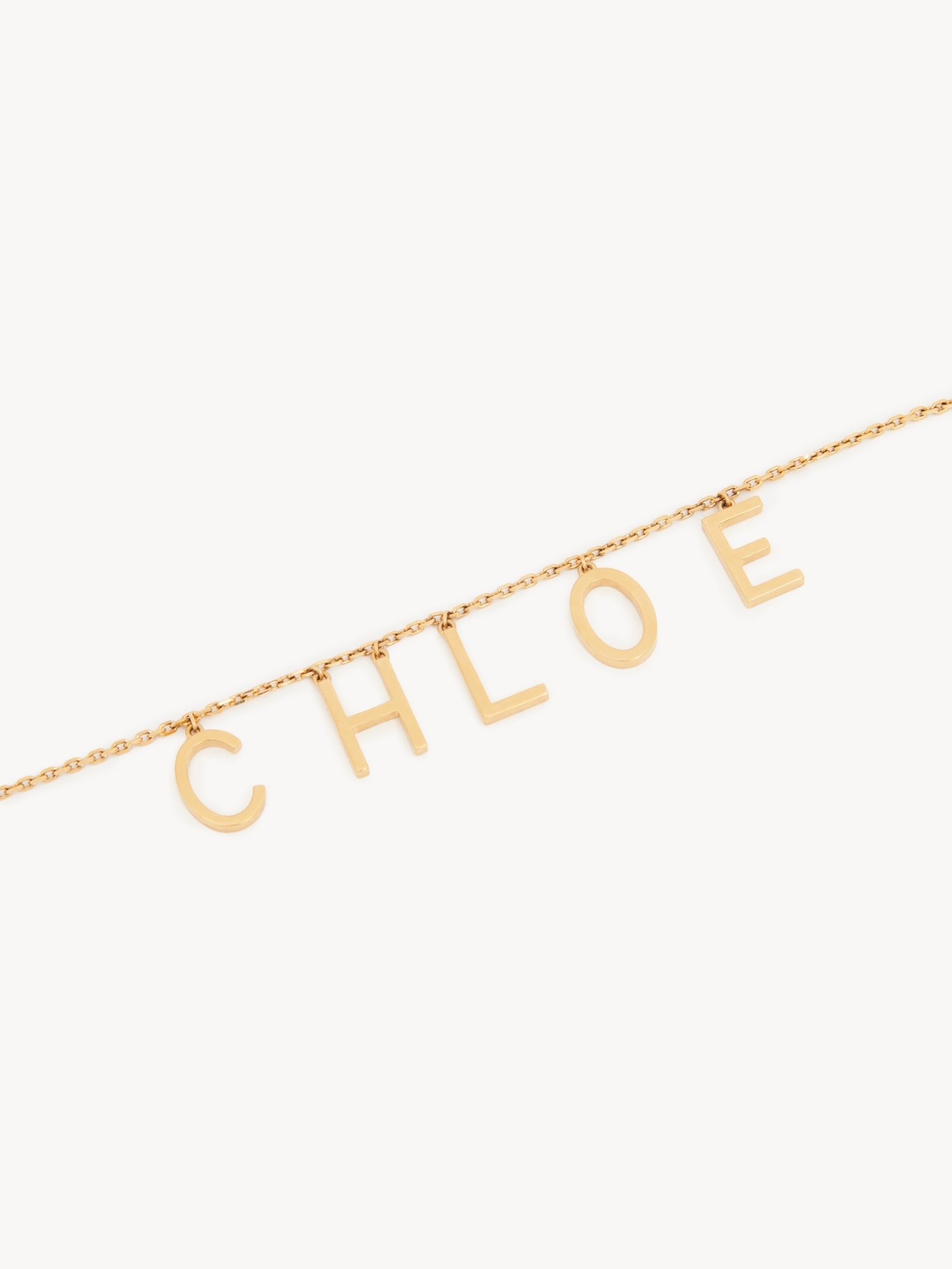 Chloé Metallic Belt With Adjustable Hook Closure And Logo Lettering Charm In Brass Woman In Gold
