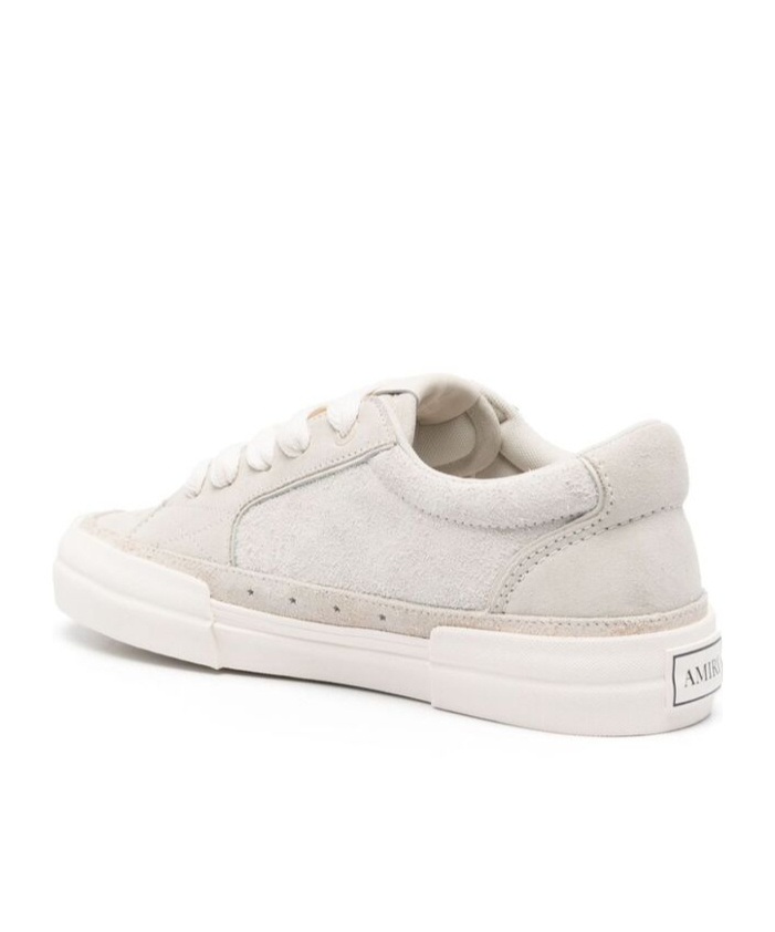 Shop Amiri Laced Sneakers In White