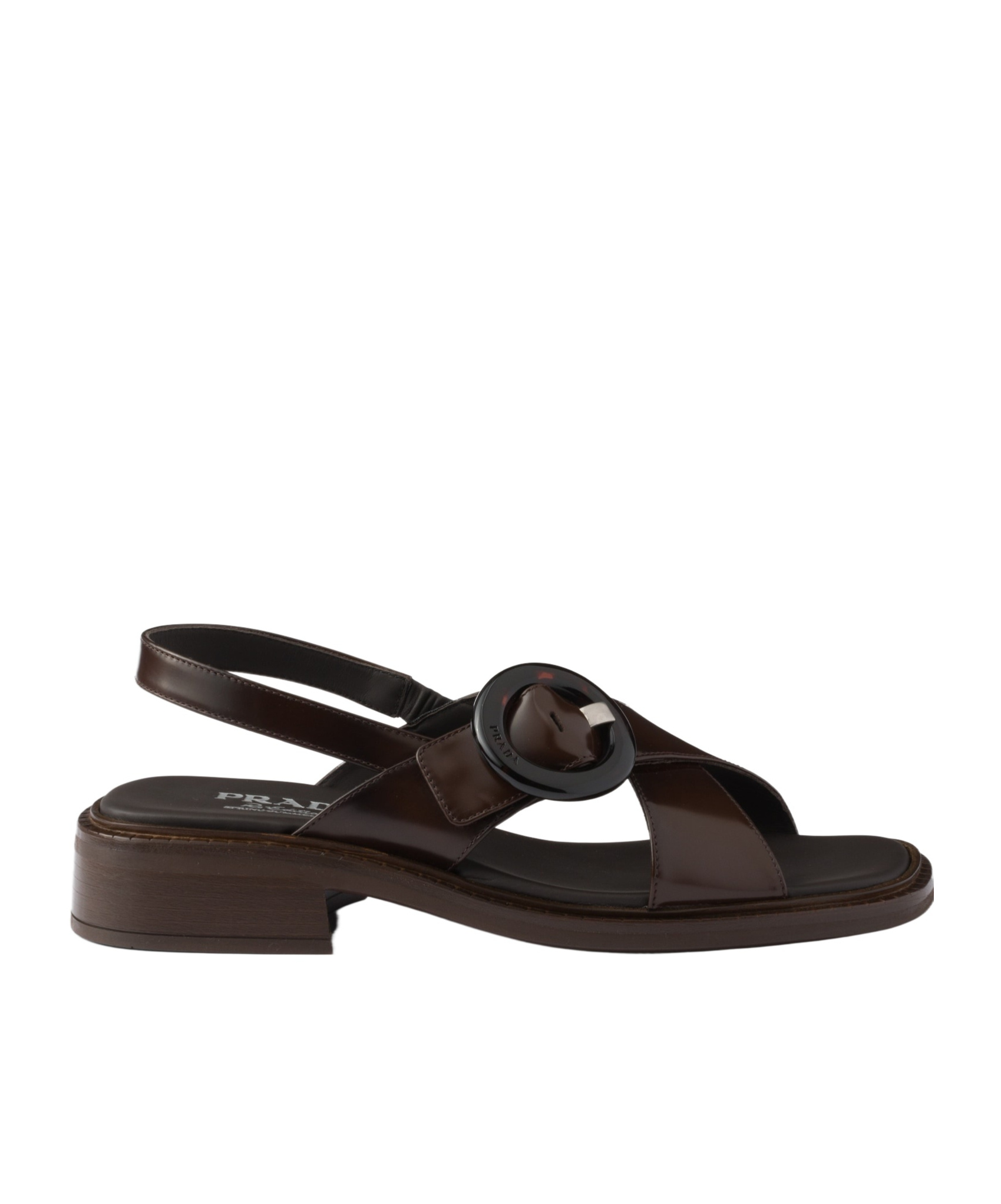 Prada Brushed Leather Crisscross Band Sandals With Plexiglas Buckle In Ochre