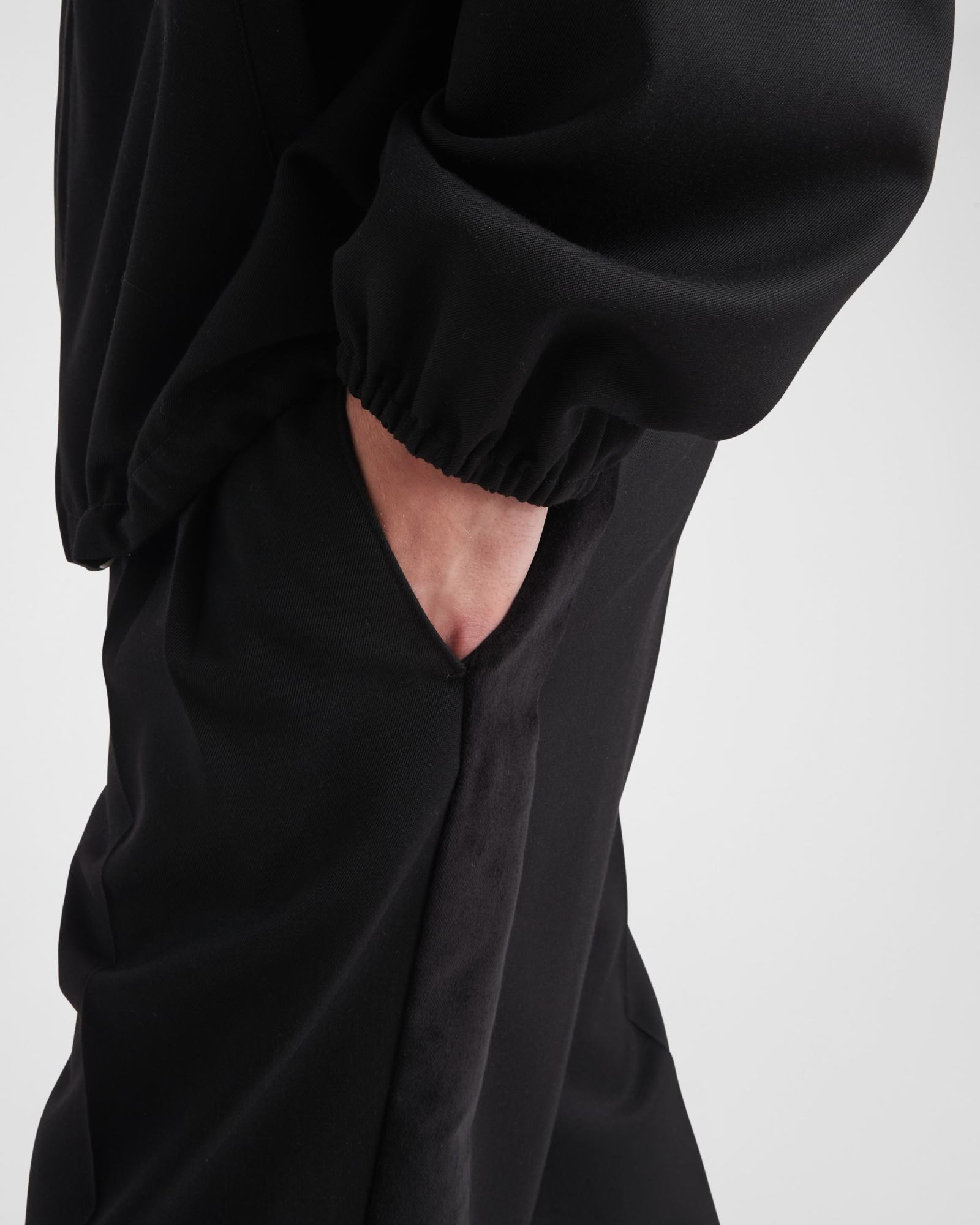 Prada Pressed-crease Velvet Tapered Trousers In Black