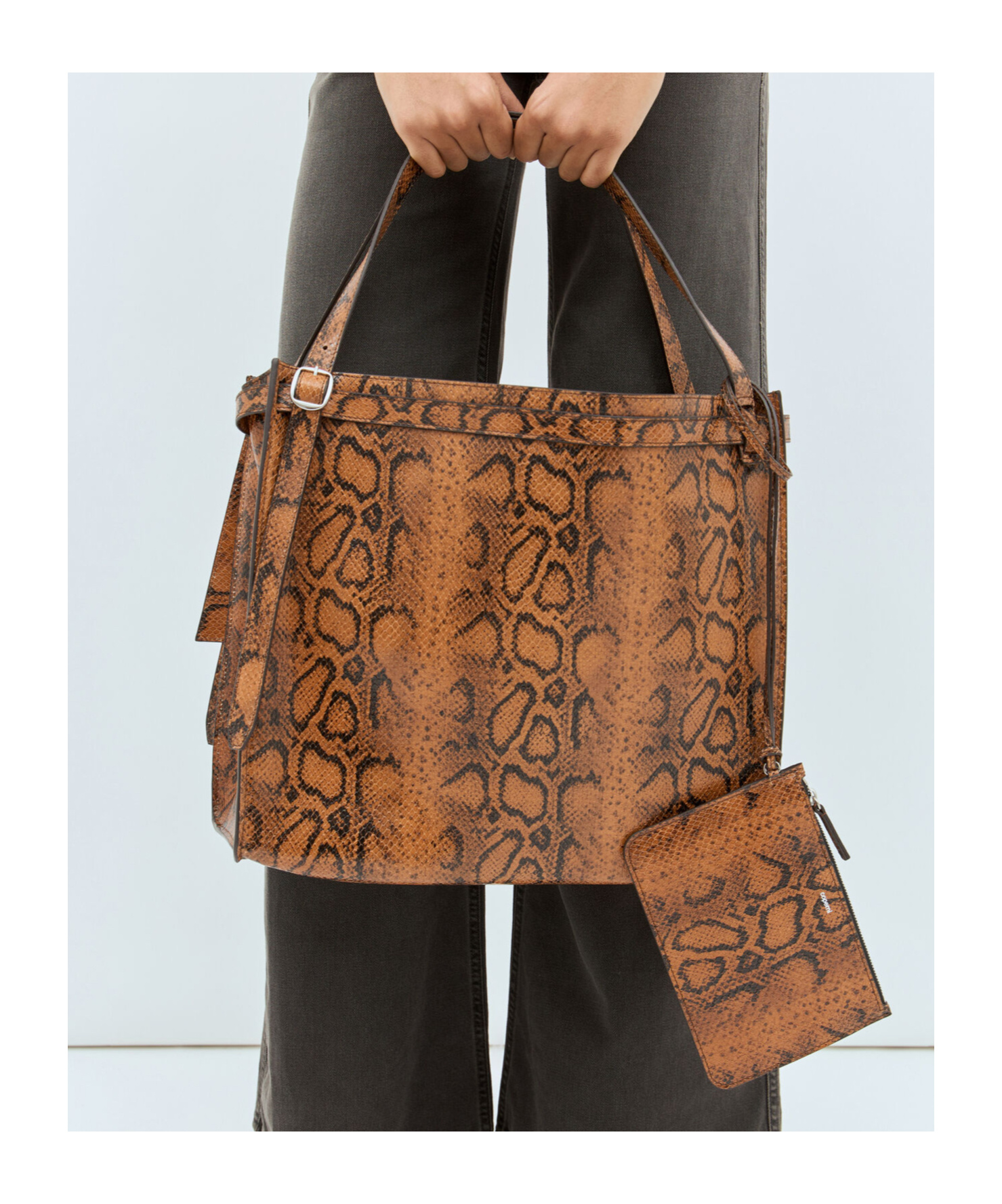 Shop Coperni Embossed Top Handle Bag In Brown
